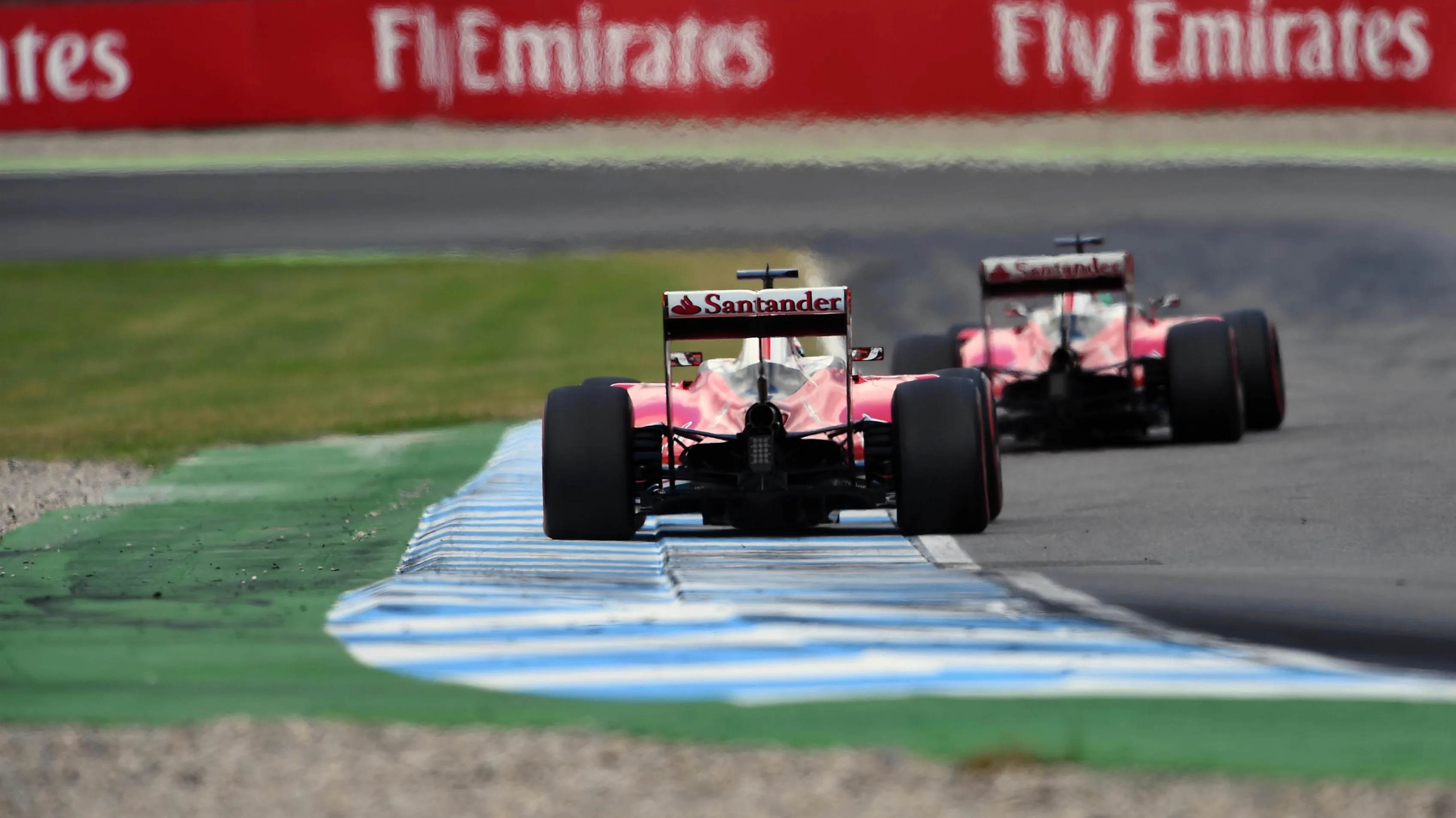 Sebastian Vettel (GER) Ferrari SF16-H and Kimi Raikkonen (FIN) Ferrari SF16-H at Formula One World Championship, Rd12, German Grand Prix, Qualifying, Hockenheim, Germany, Saturday 30 July 2016. © Sutton Images