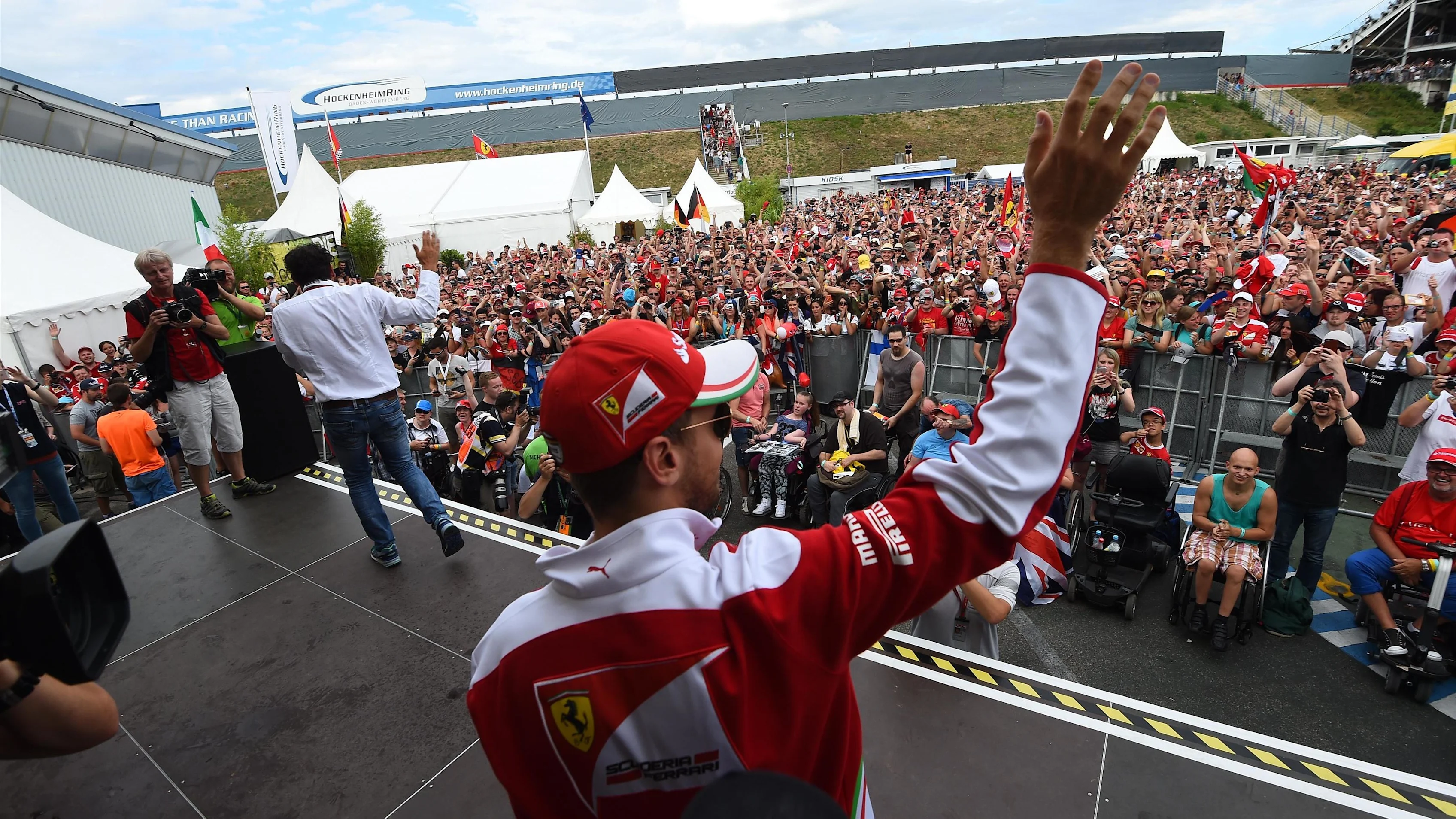 Sebastian Vettel (GER) Ferrari at the autograph session at Formula One World Championship, Rd12,