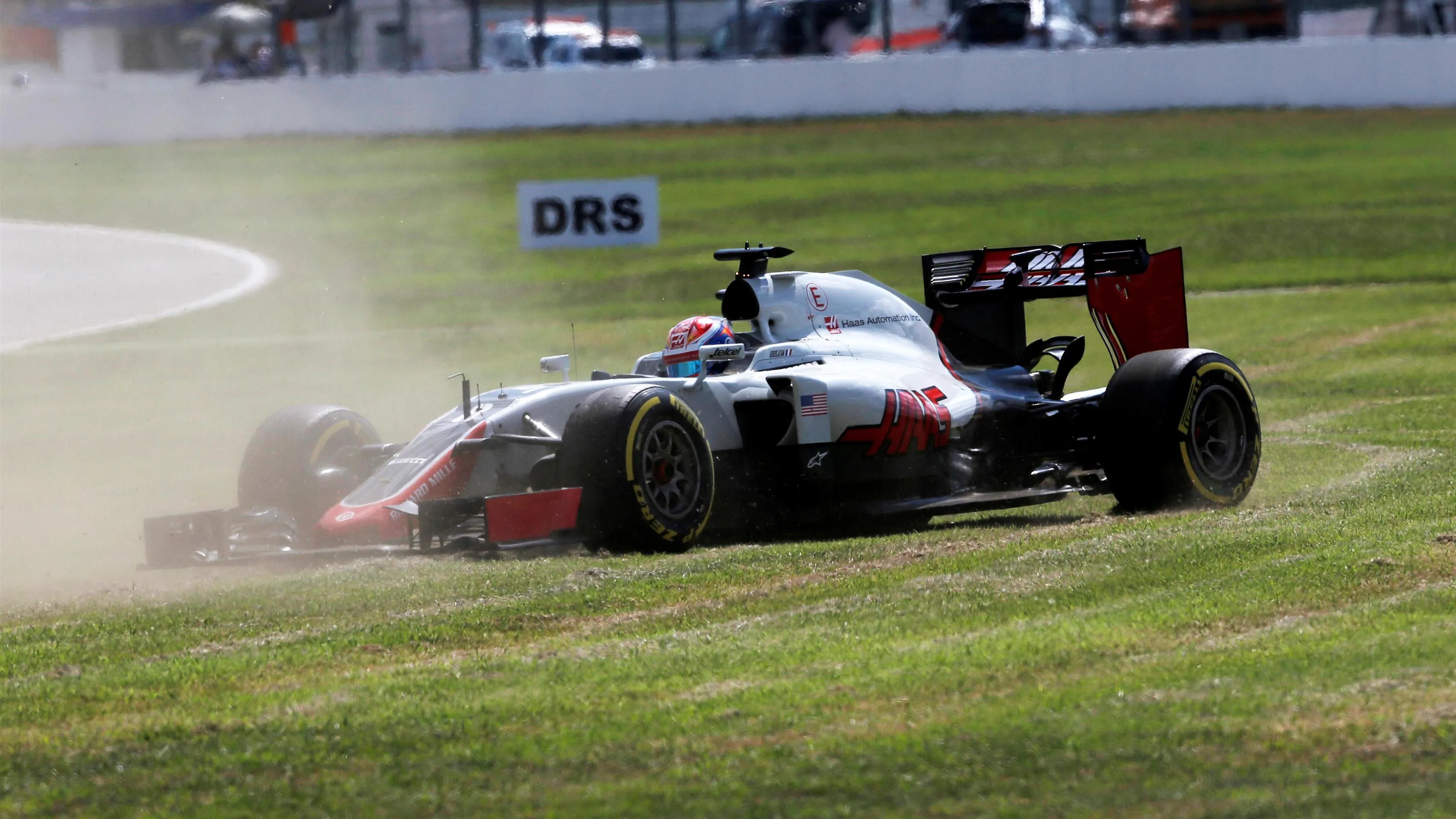 Romain Grosjean (FRA) Haas VF-16 spins across the grass at Formula One World Championship, Rd12, German Grand Prix, Qualifying, Hockenheim, Germany, Saturday 30 July 2016. © Sutton Images