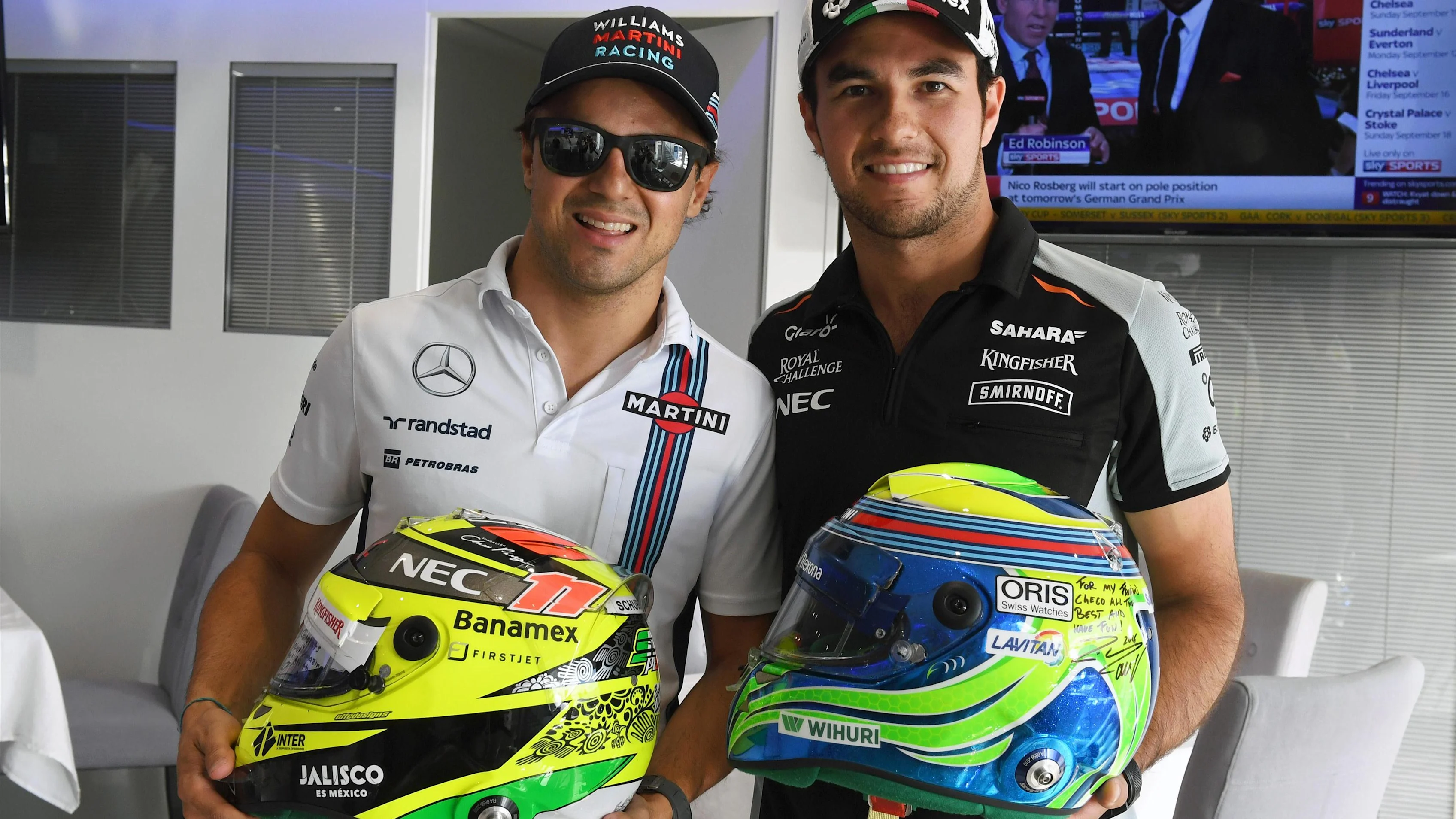Felipe Massa (BRA) Williams and Sergio Perez (MEX) Force India exchange helmets at Formula One