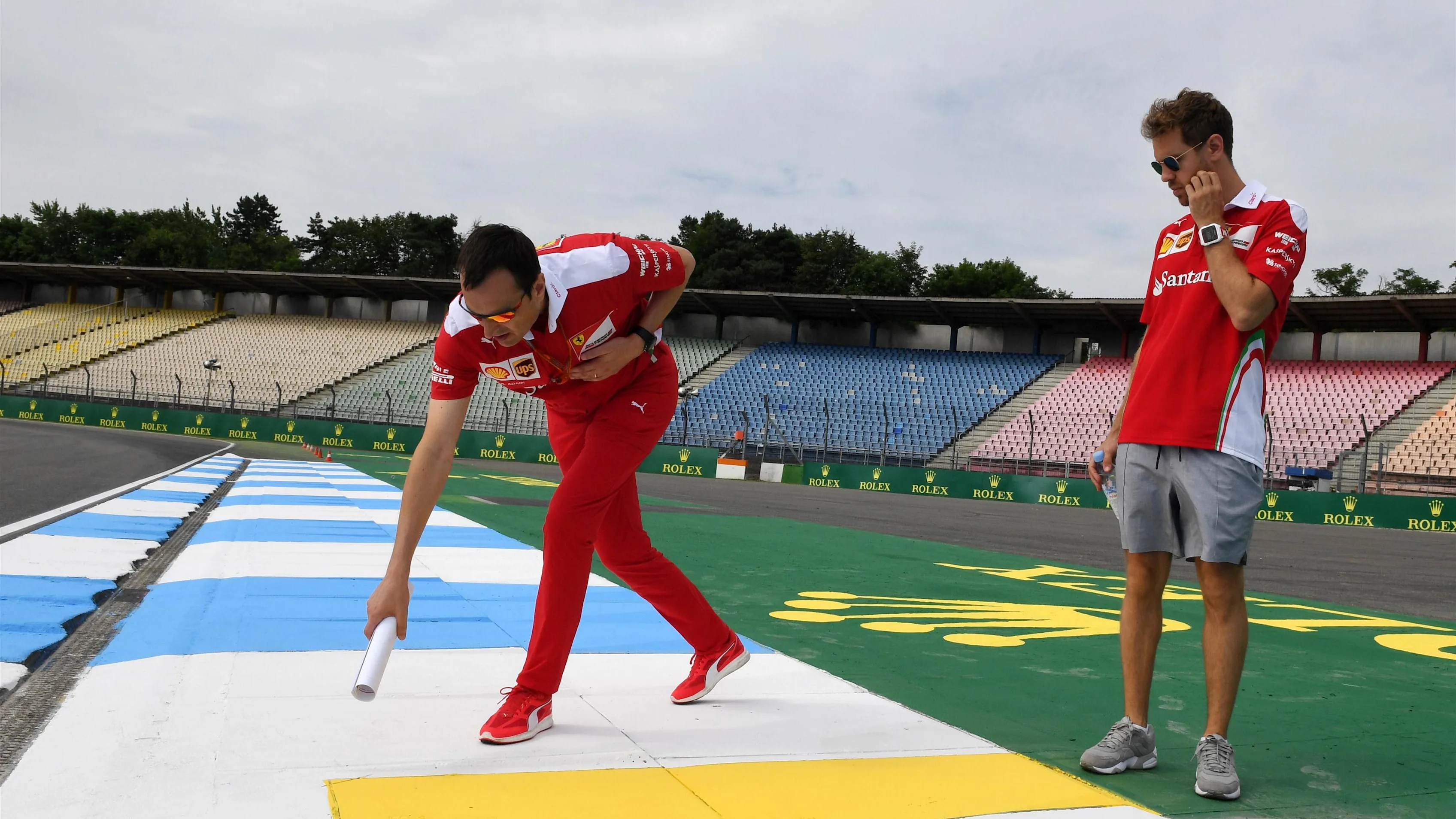 Sebastian Vettel (GER) Ferrari walks the track with Riccardo Adami (ITA) Ferrari Race Engineer and looks at the kerbs at Formula One World Championship, Rd12, German Grand Prix, Preparations, Hockenheim, Germany, Thursday 28 July 2016. © Sutton Images