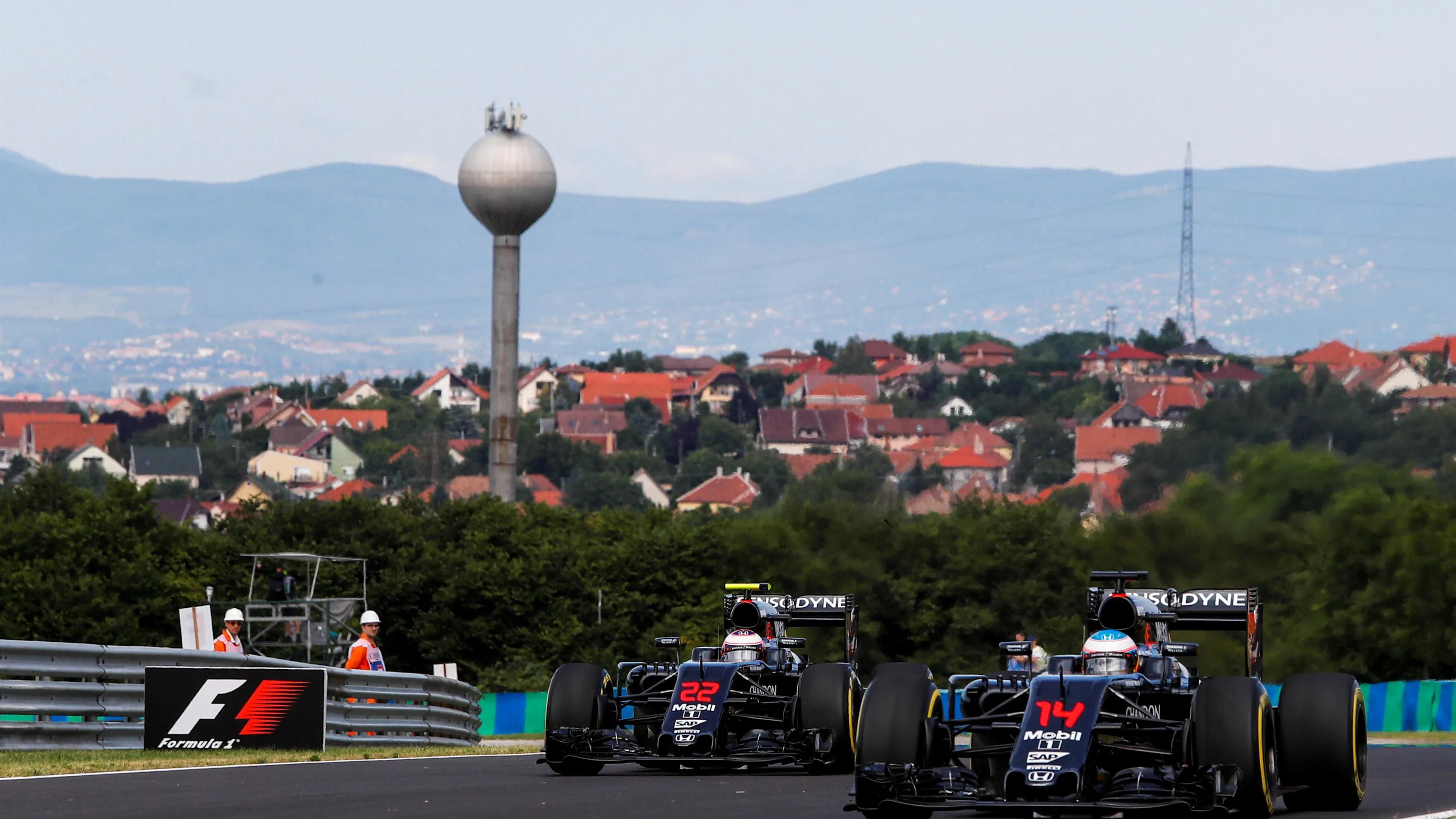 Jenson Button (GBR) McLaren MP4-31 and Fernando Alonso (ESP) McLaren MP4-31 at Formula One World