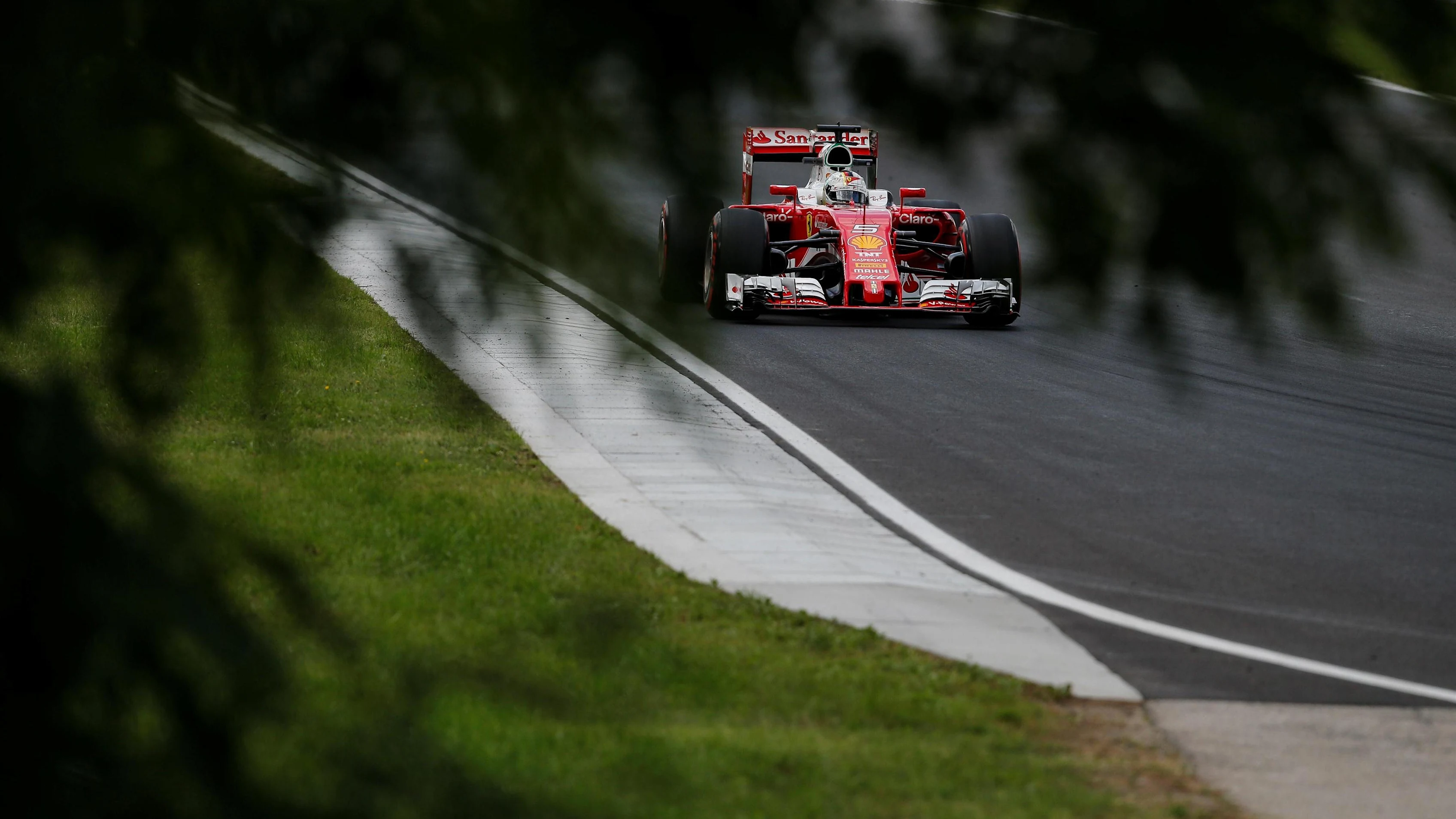 Sebastian Vettel (GER) Ferrari SF16-H at Formula One World Championship, Rd11, Practice, Hungaroring, Hungary, Friday 22 July 2016. © Sutton Images