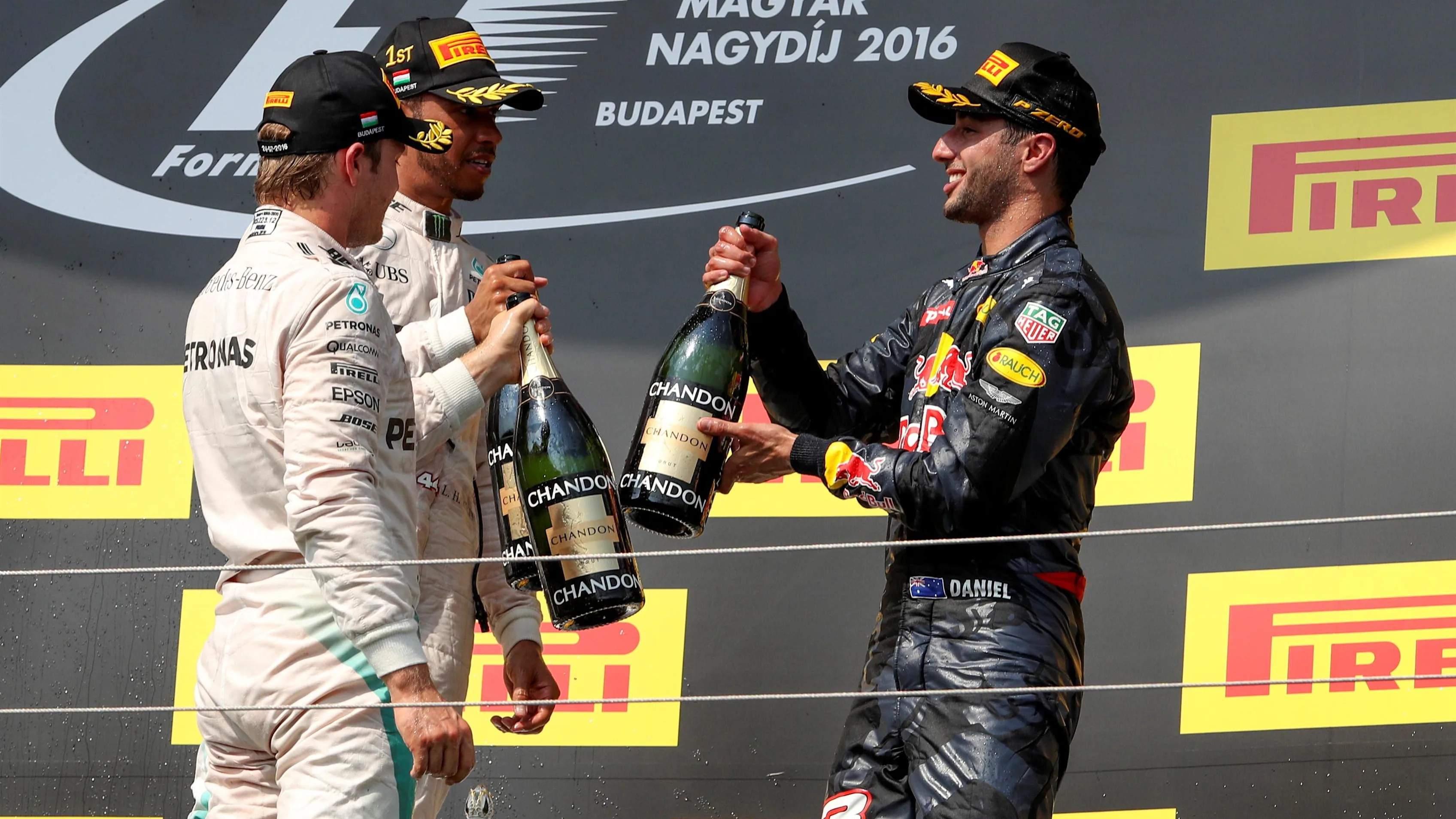 Nico Rosberg (GER) Mercedes AMG F1, race winner Lewis Hamilton (GBR) Mercedes AMG F1 and Daniel