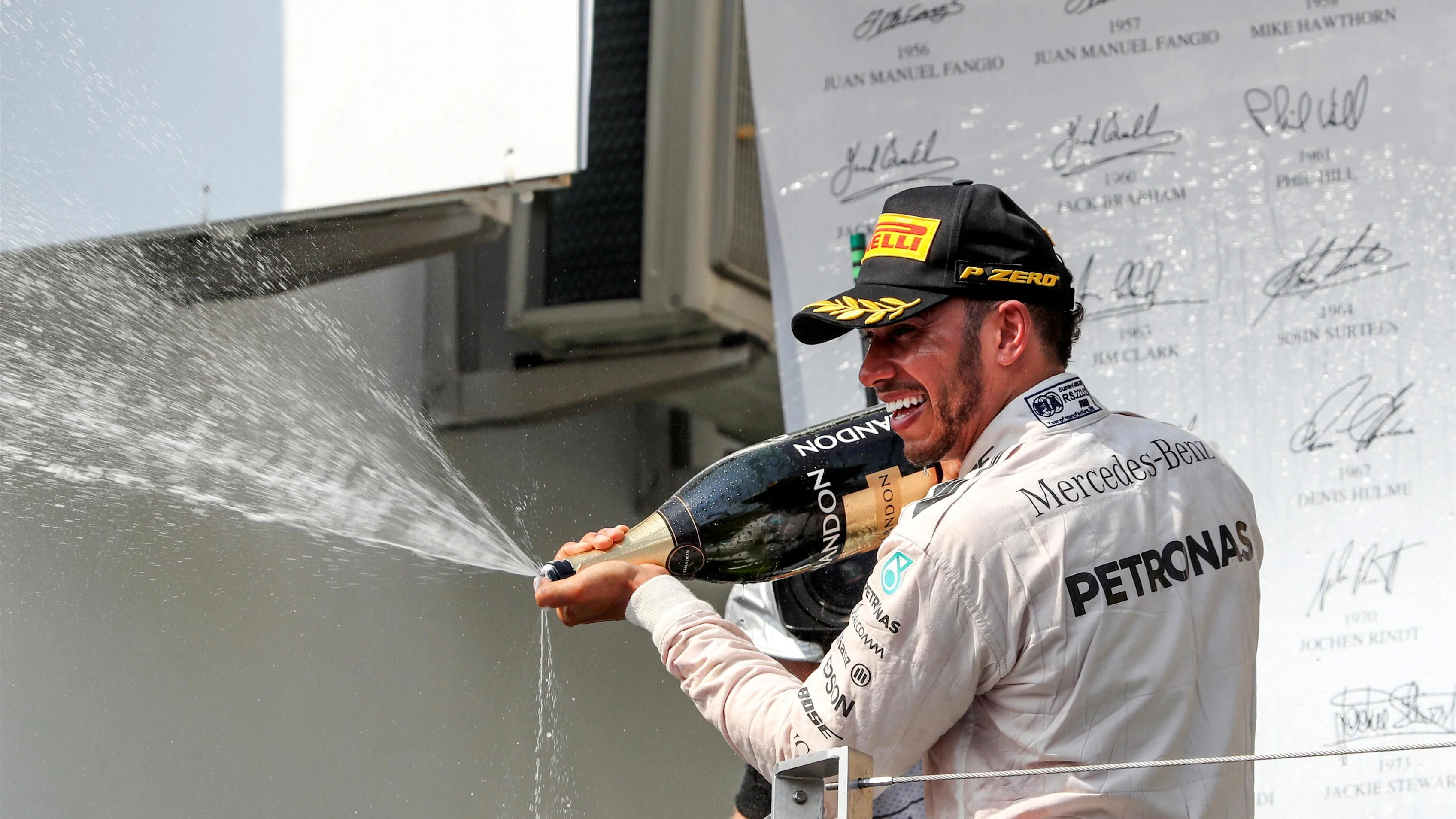 Lewis Hamilton (GBR) Mercedes AMG F1 celebrates on the podium with the champagne at Formula One
