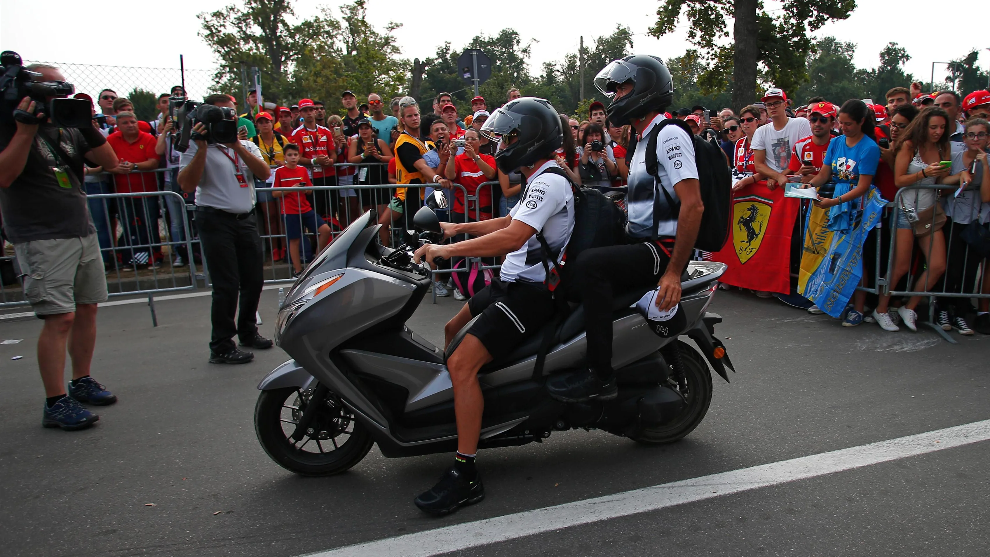 Fernando Alonso (ESP) McLaren on a scooter at Formula One World Championship, Rd14, Italian Grand Prix, Race, Monza, Italy, Sunday 4 September 2016. © Sutton Images