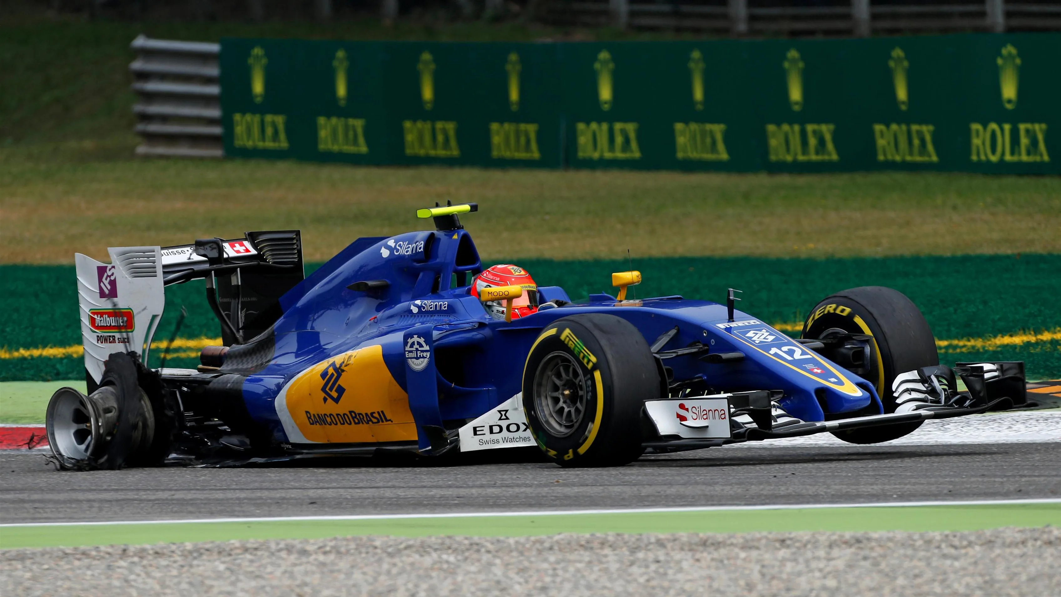 Felipe Nasr (BRA) Sauber C35 with rear puncture on lap one at Formula One World Championship, Rd14, Italian Grand Prix, Race, Monza, Italy, Sunday 4 September 2016. © Sutton Images