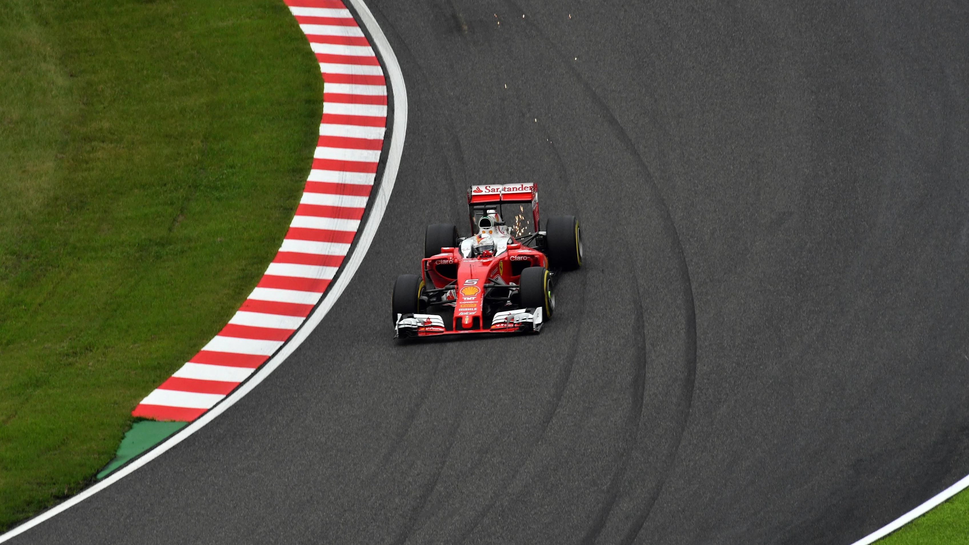 Sebastian Vettel (GER) Ferrari SF16-H sparks at Formula One World Championship, Rd17, Japanese Grand Prix, Qualifying, Suzuka, Japan, Saturday 8 October 2016. © Sutton Images