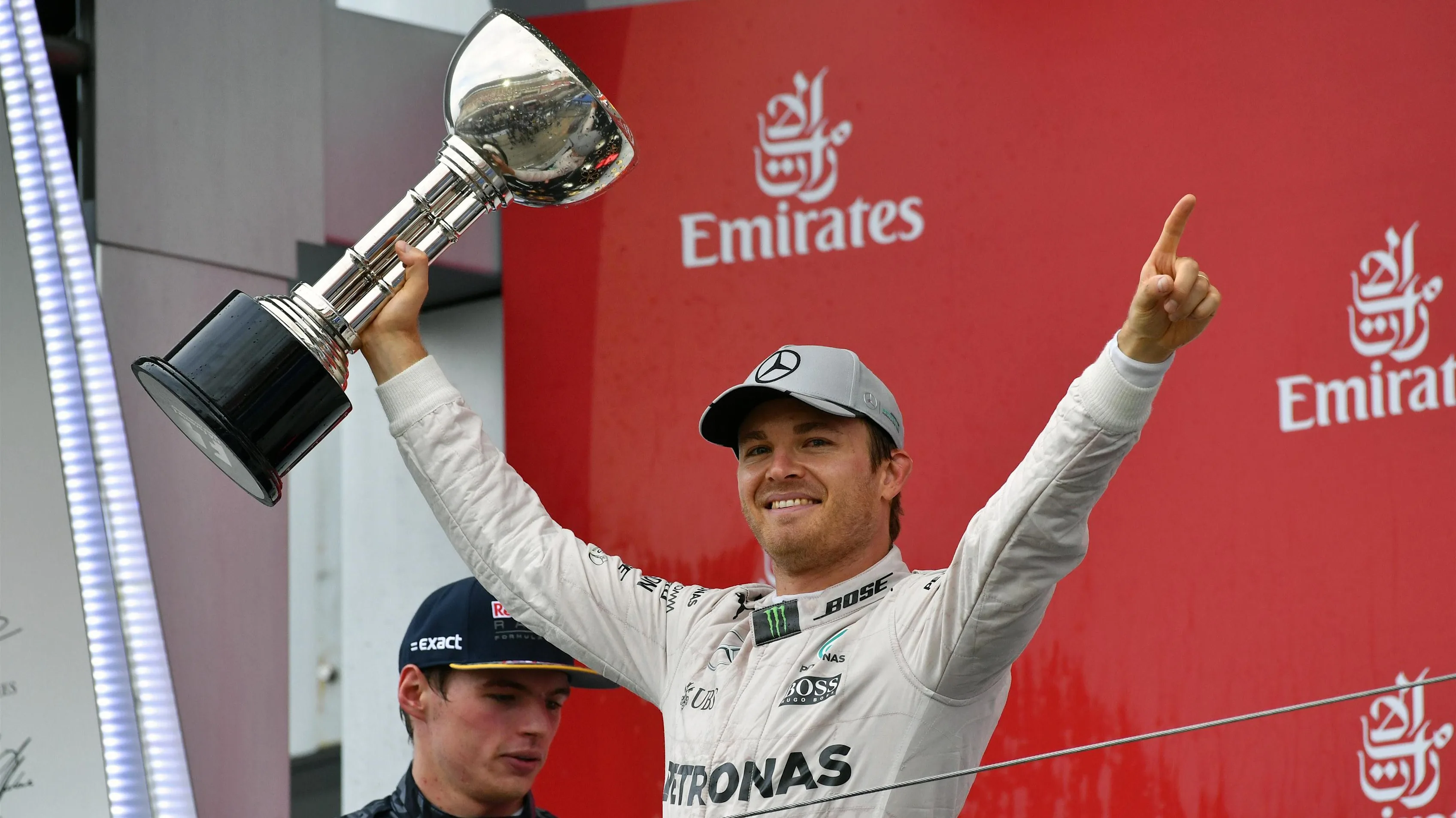 Race winner Nico Rosberg (GER) Mercedes AMG F1 celebrates on the podium with the trophy at Formula
