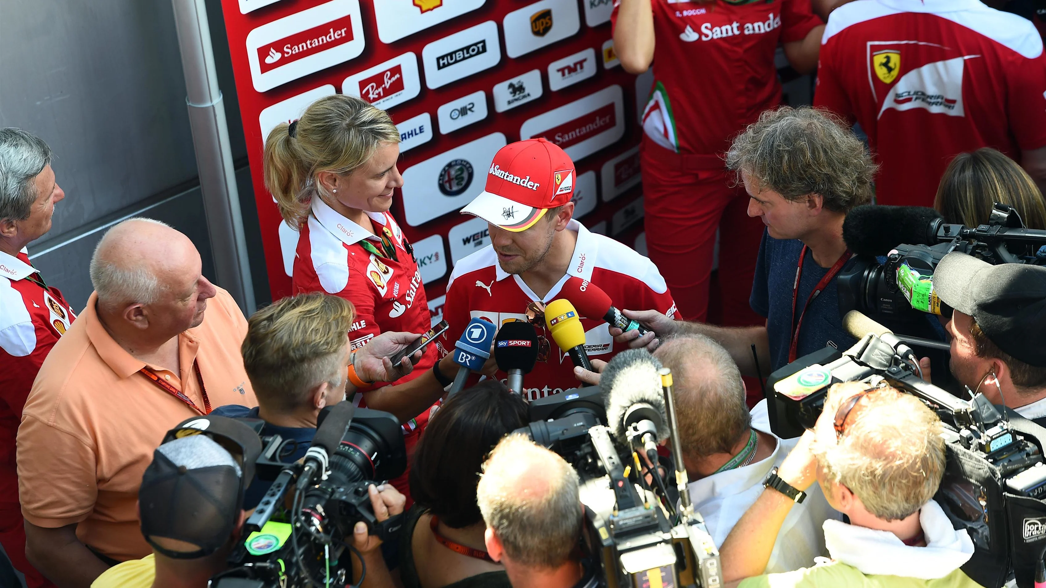 Sebastian Vettel (GER) Ferrari talks to the media at Formula One World Championship, Rd16,