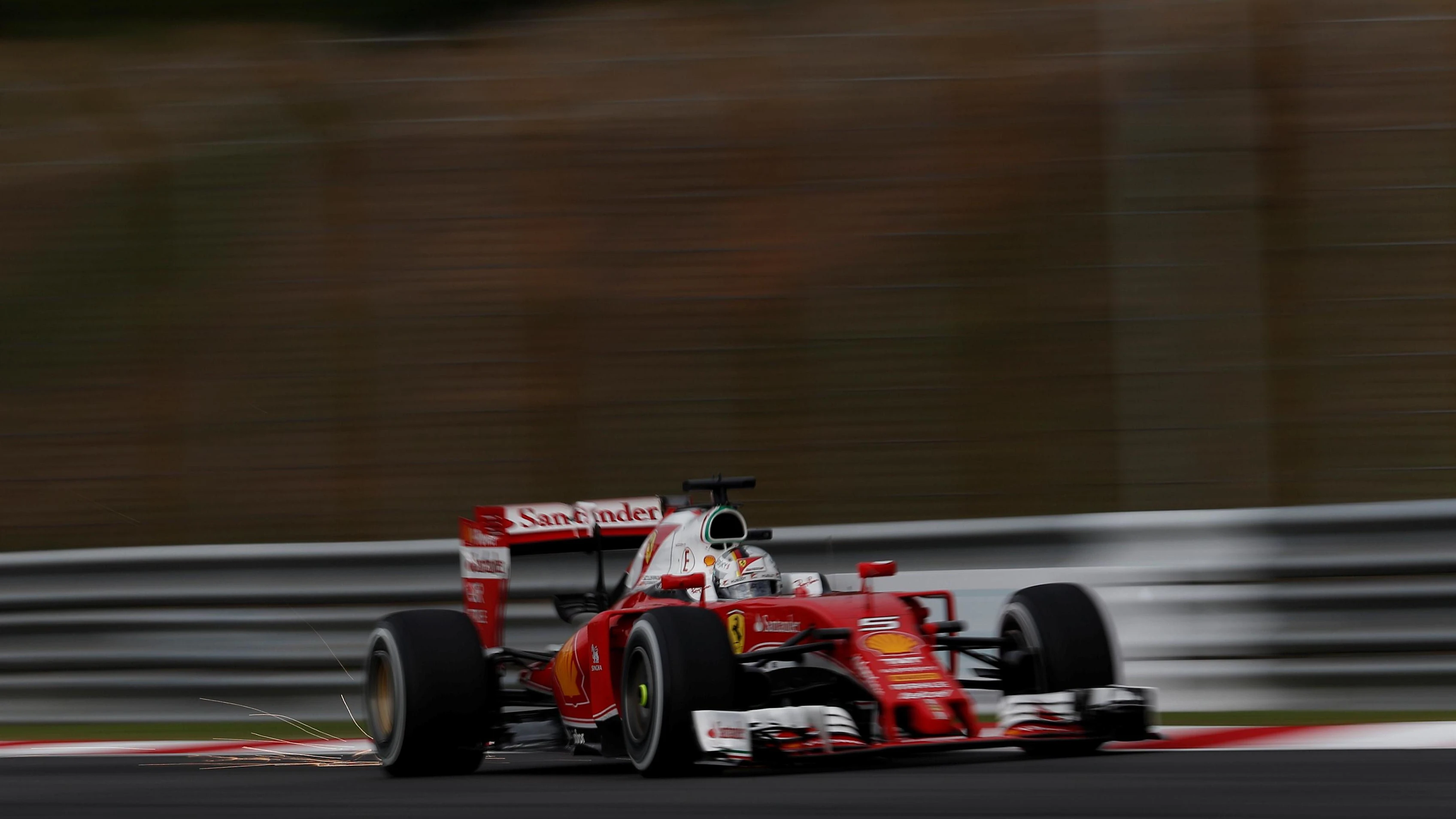 Sebastian Vettel (GER) Ferrari SF16-H sparks at Formula One World Championship, Rd16, Malaysian Grand Prix, Qualifying, Sepang, Malaysia, Saturday 1 October 2016. © Sutton Images