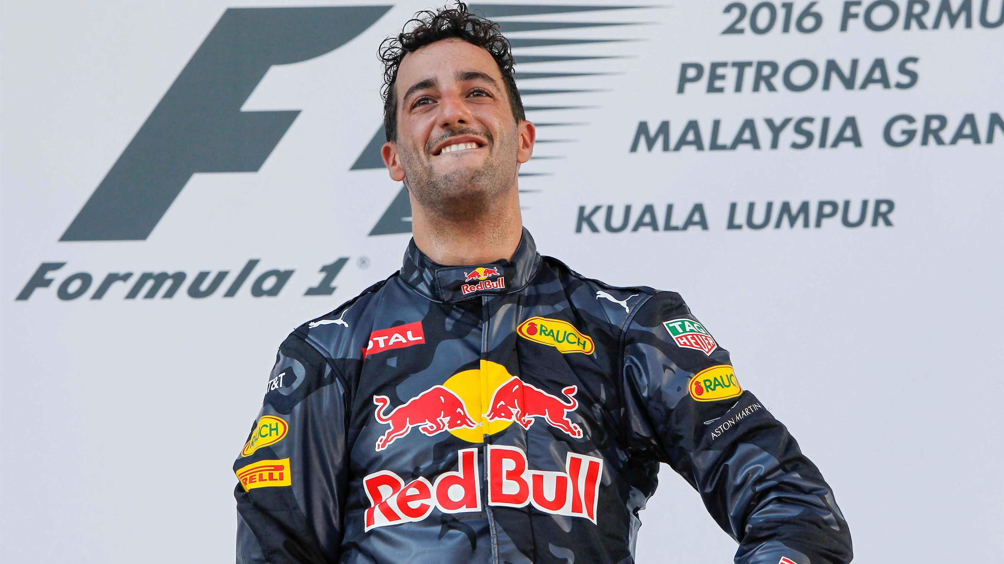 Race winner Daniel Ricciardo (AUS) Red Bull Racing celebrates on the podium at Formula One World Championship, Rd16, Malaysian Grand Prix, Race, Sepang, Malaysia, Sunday 2 October 2016. © Sutton Images