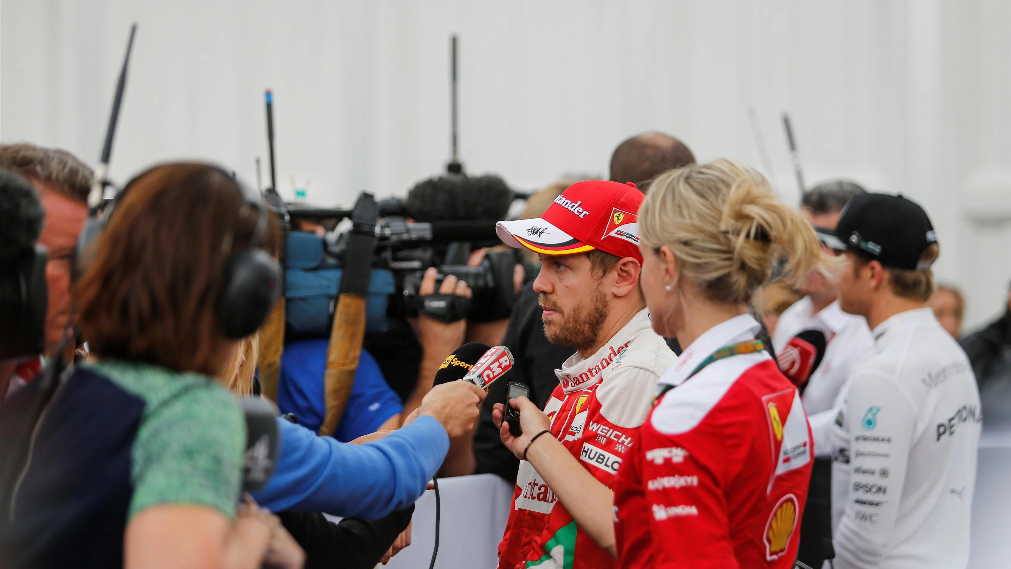 Sebastian Vettel (GER) Ferrari talks with the media at Formula One World Championship, Rd19,
