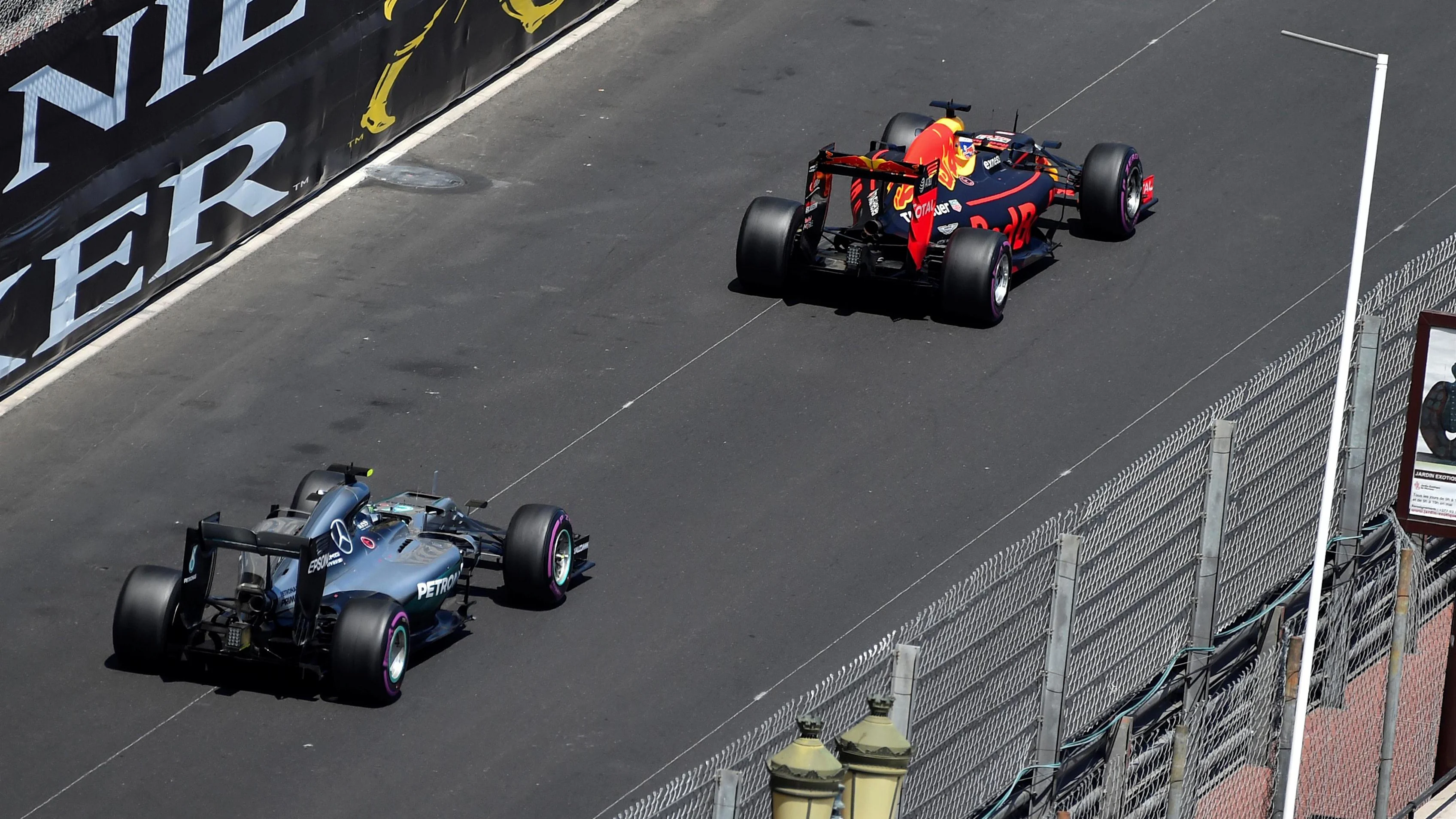 Nico Rosberg (GER) Mercedes-Benz F1 W07 Hybrid and Daniel Ricciardo (AUS) Red Bull Racing RB12 at