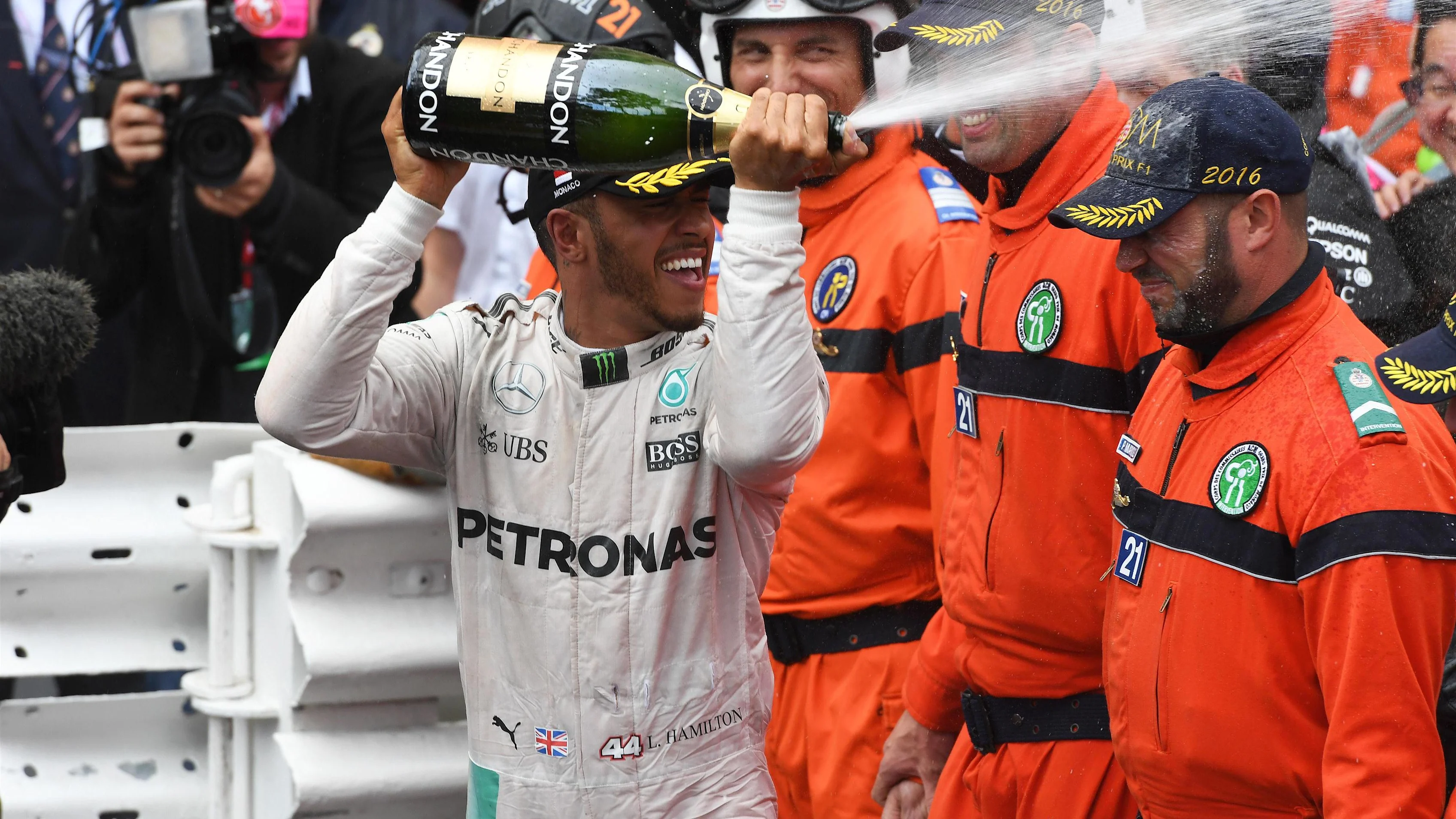 Race winner Lewis Hamilton (GBR) Mercedes AMG F1 celebrates with the champagne at the podium at