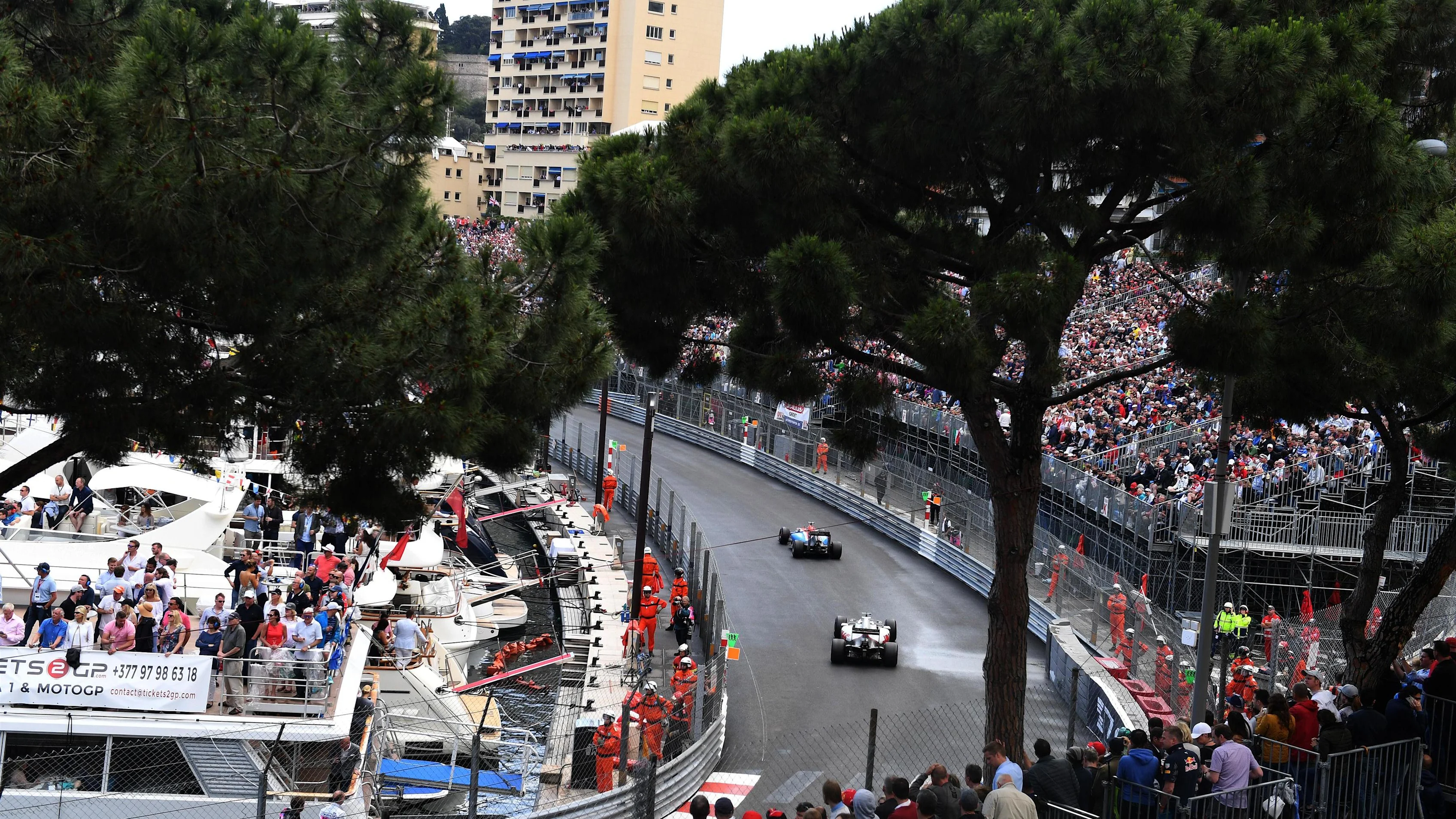 Pascal Wehrlein (GER) Manor Racing MRT05 and Romain Grosjean (FRA) Haas VF-16 at Formula One World Championship, Rd6, Monaco Grand Prix, Race, Monte-Carlo, Monaco, Sunday 29 May 2016. © Sutton Images