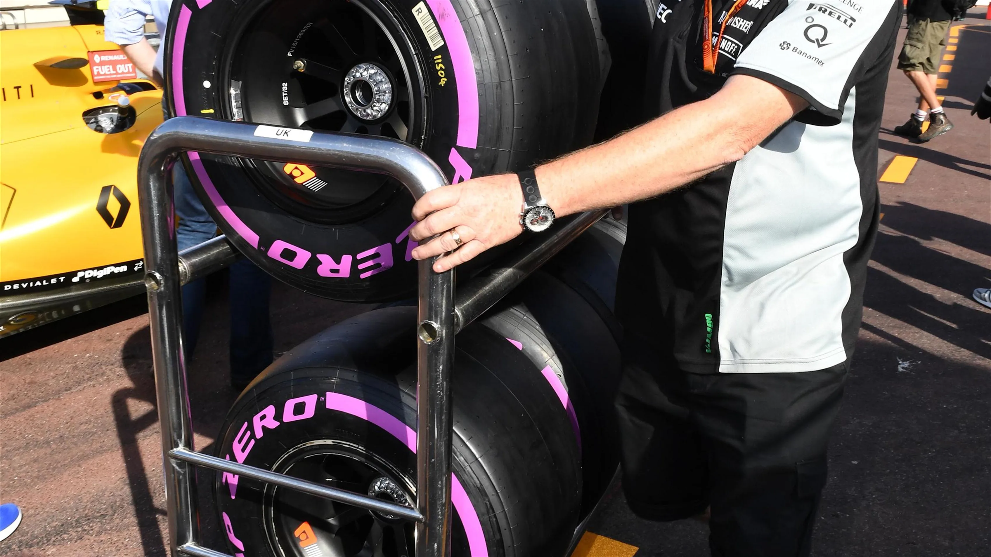 Force India mechanic with Pirelli tyres at Formula One World Championship, Rd6, Monaco Grand Prix,