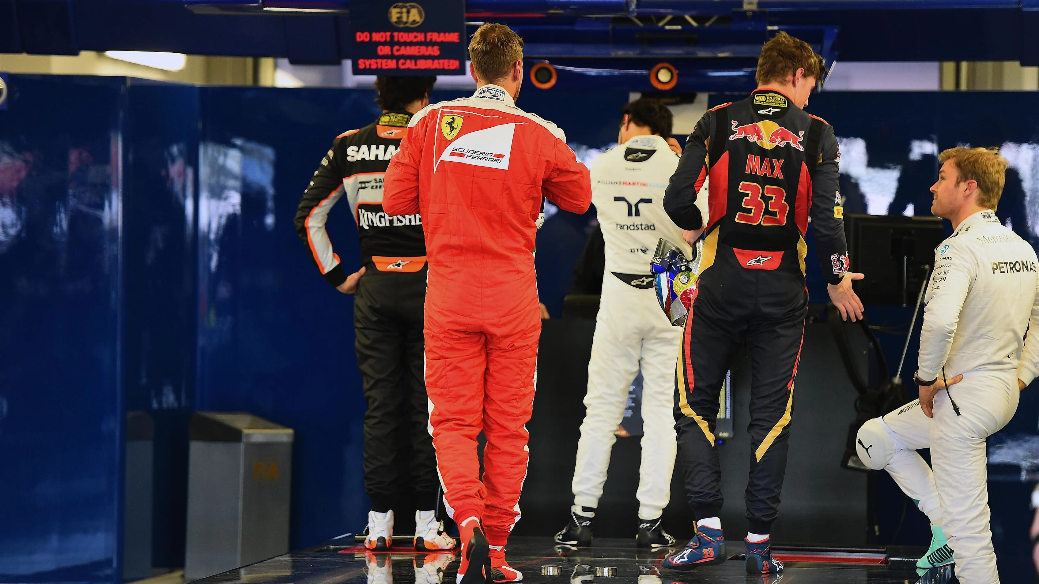 Sebastian Vettel (GER) Ferrari, Daniil Kvyat (RUS) Red Bull Racing and Nico Rosberg (GER) Mercedes AMG F1 in parc ferme at Formula One World Championship, Rd4, Russian Grand Prix, Qualifying, Sochi Autodrom, Sochi, Krasnodar Krai, Russia, Saturday 30 April 2016. © Sutton Motorsport Images