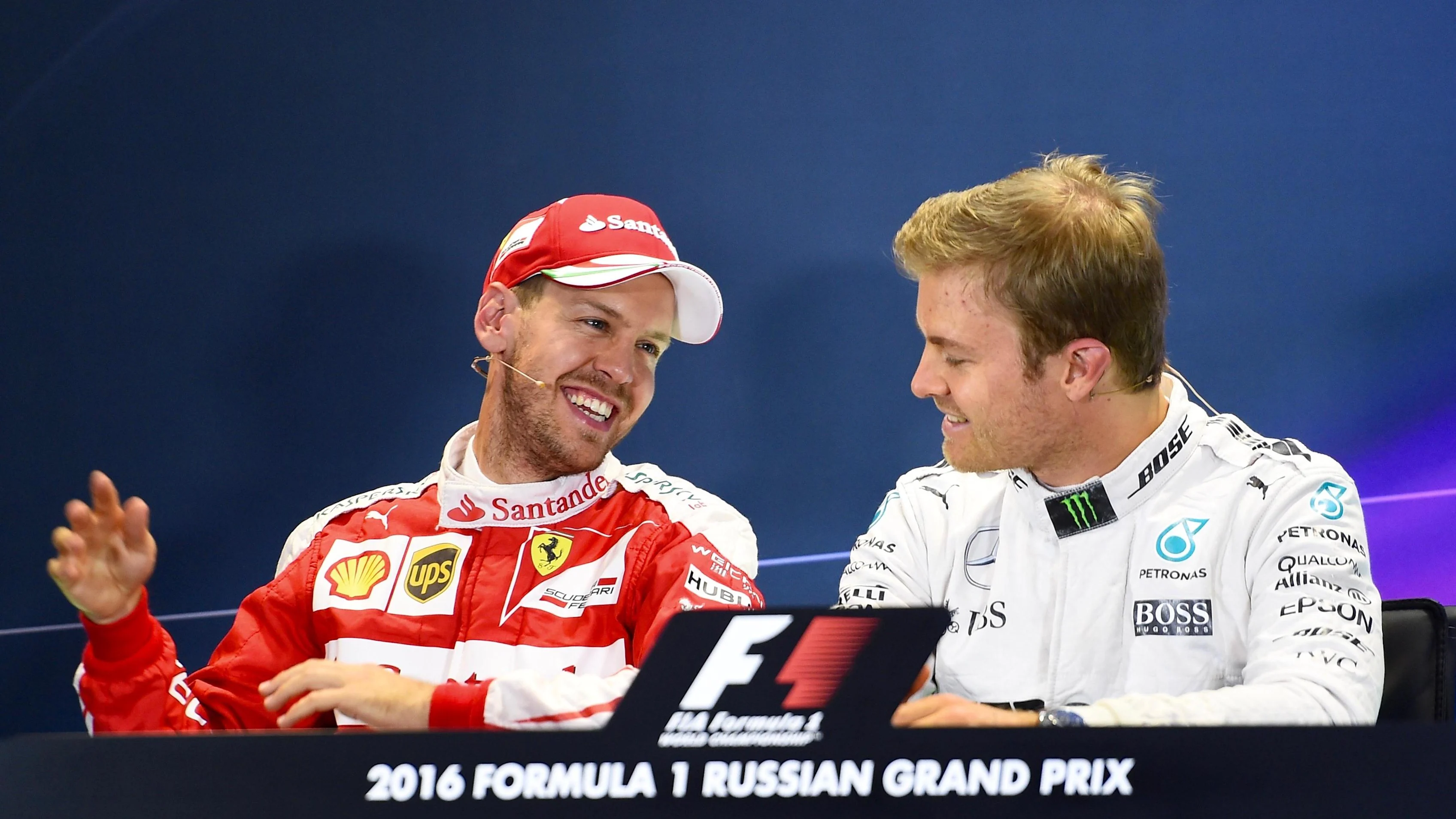 Sebastian Vettel (GER) Ferrari and Nico Rosberg (GER) Mercedes AMG F1 in the Press Conference at