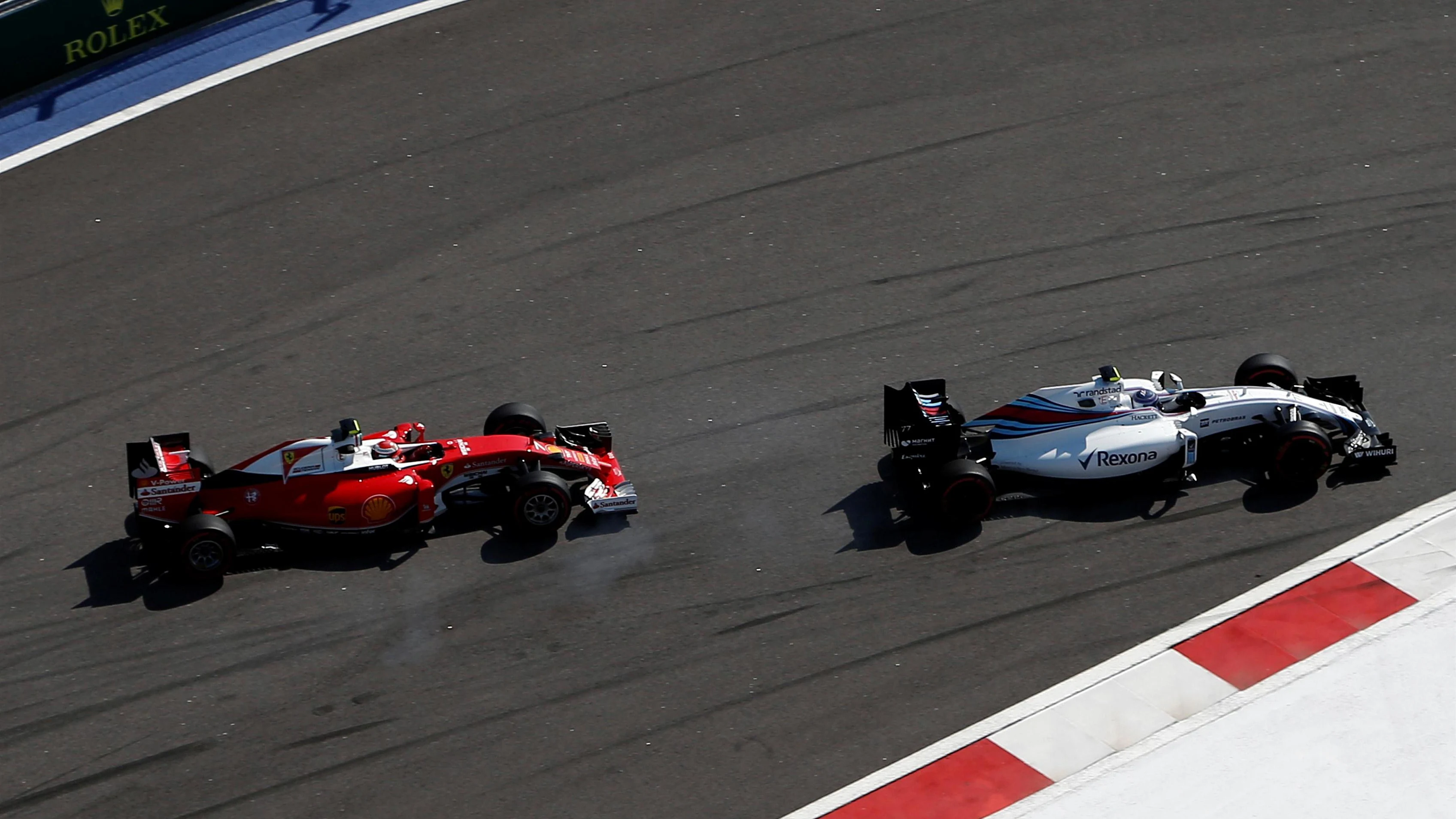 Valtteri Bottas (FIN) Williams FW38 leads Kimi Raikkonen (FIN) Ferrari SF16-H at Formula One World
