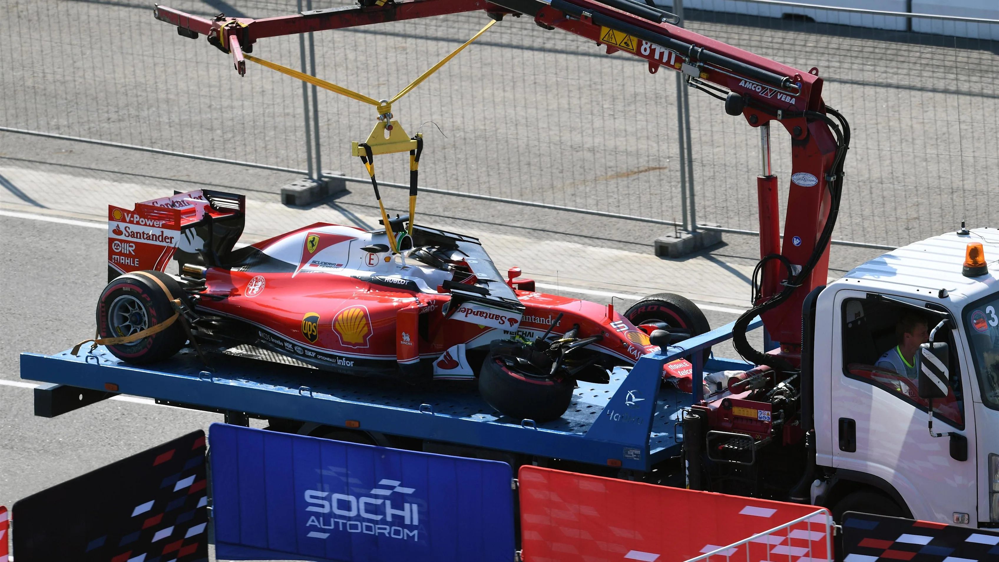 The car of race retiree Sebastian Vettel (GER) Ferrari SF16-H is recovered at Formula One World