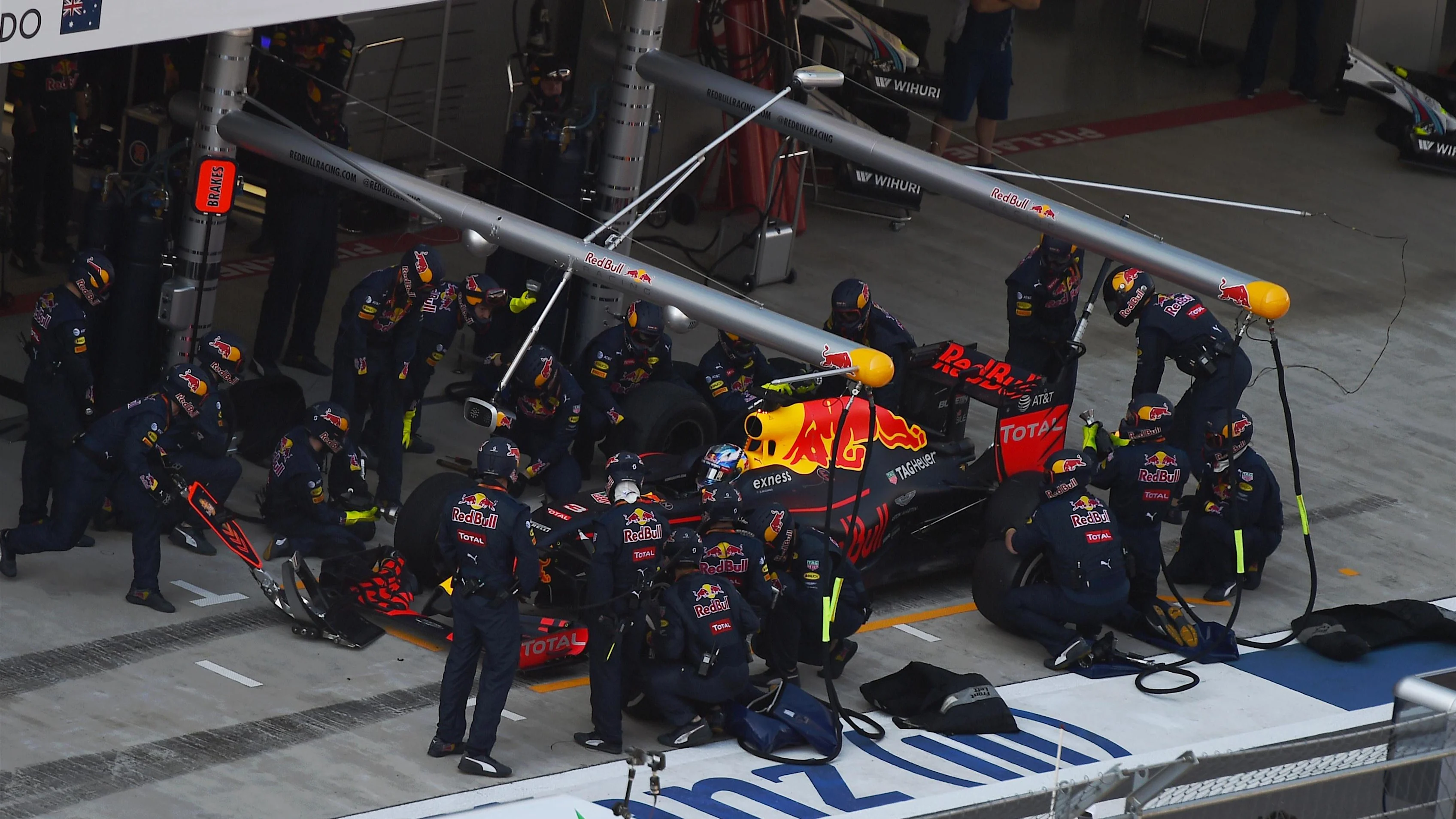 Daniel Ricciardo (AUS) Red Bull Racing RB12 pit stop at Formula One World Championship, Rd4,