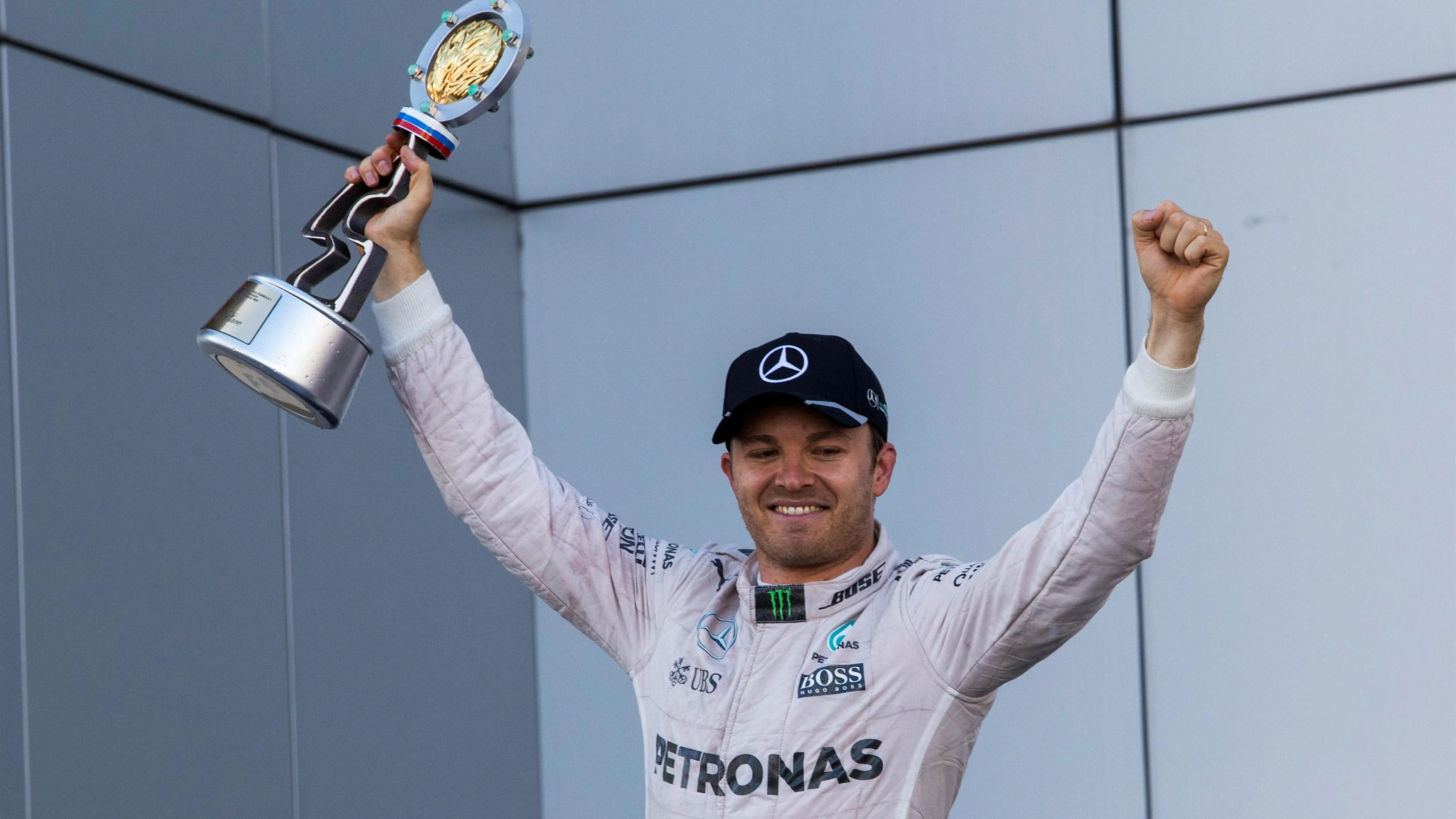 Race winner Nico Rosberg (GER) Mercedes AMG F1 celebrates on the podium with the trophy at Formula