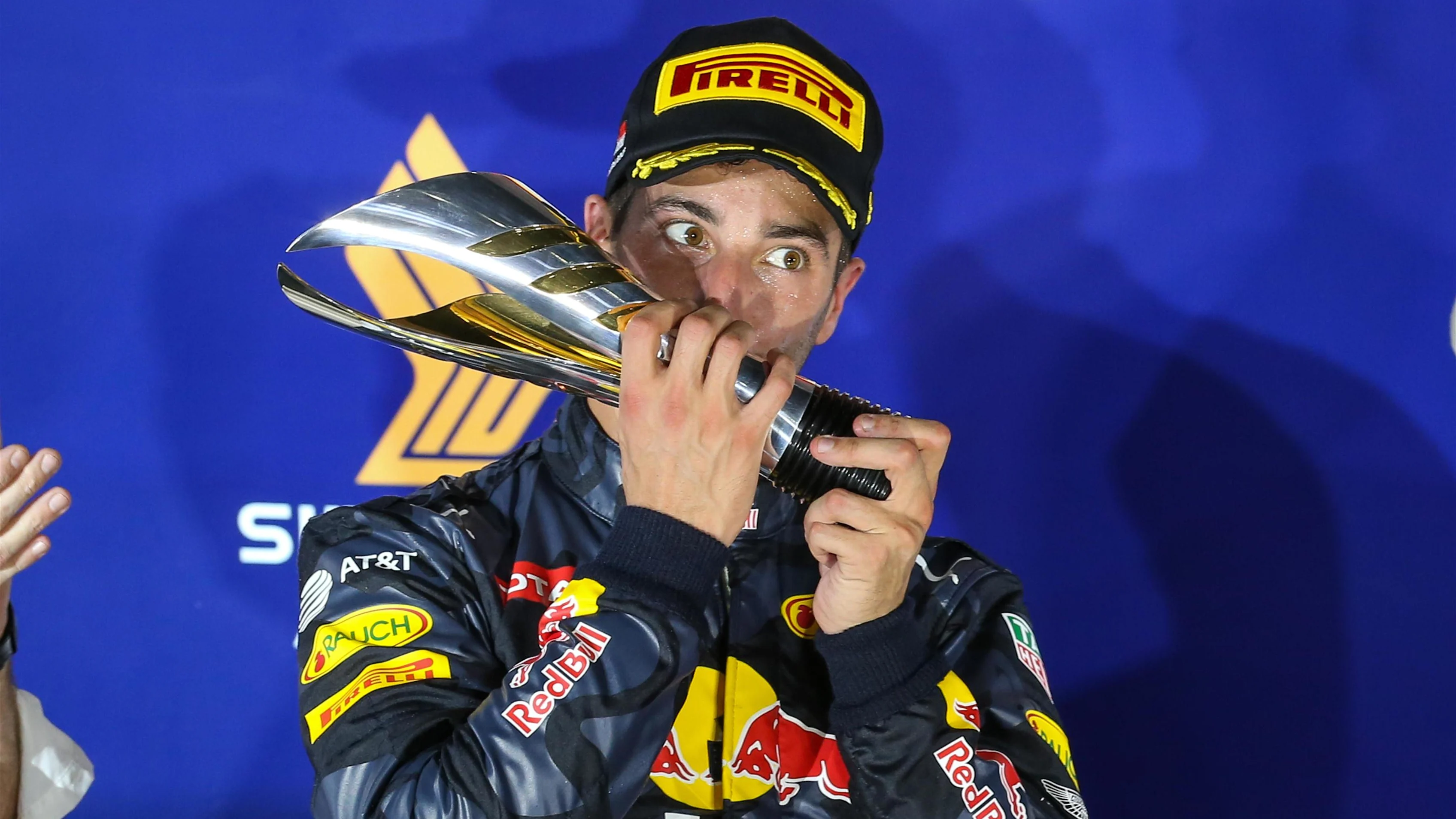 Daniel Ricciardo (AUS) Red Bull Racing celebrates on the podium with the trophy at Formula One World Championship, Rd15, Singapore Grand Prix, Race, Marina Bay Street Circuit, Singapore, Sunday 18 September 2016. © Sutton Images