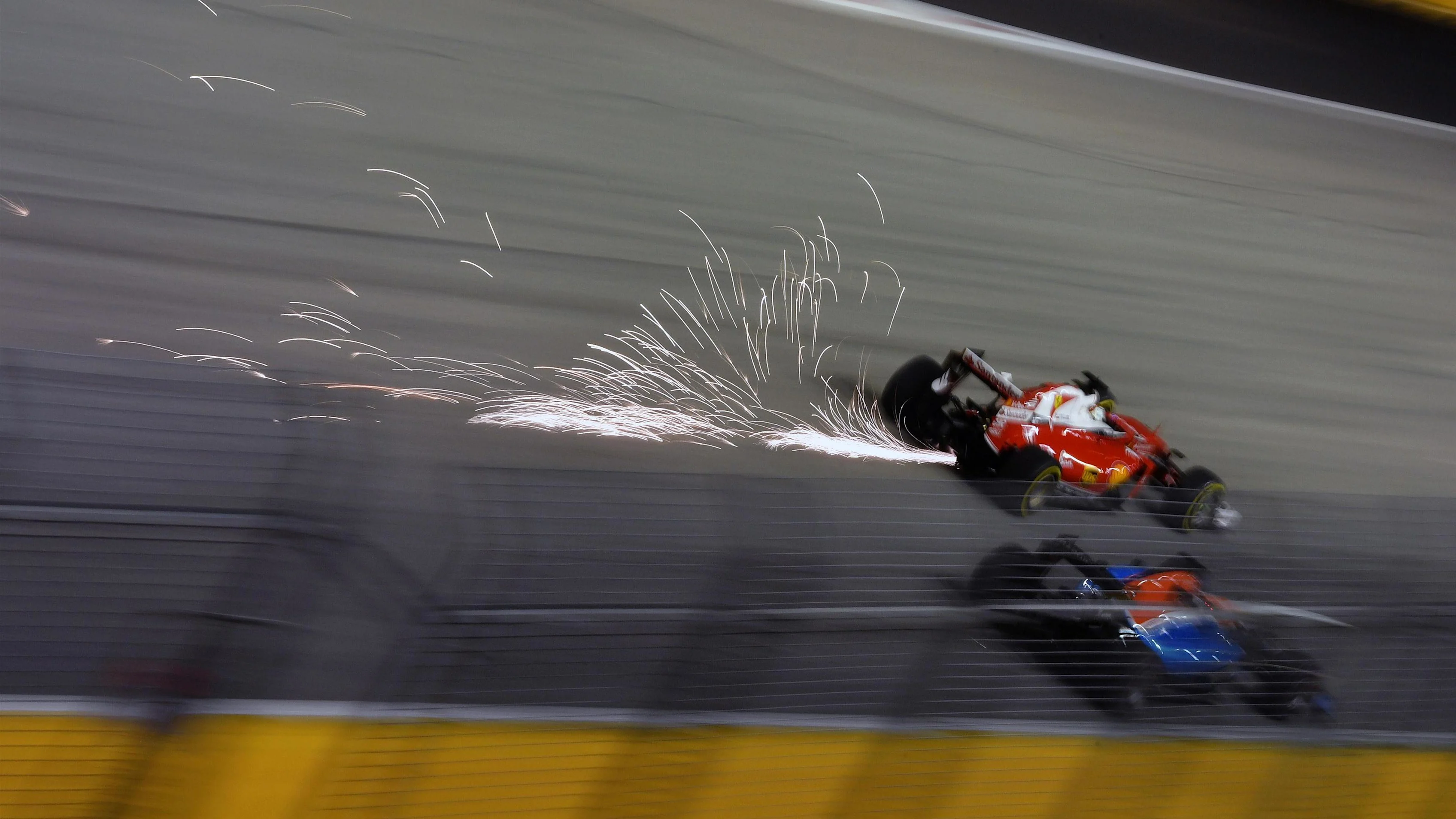 Sebastian Vettel (GER) Ferrari SF16-H and Pascal Wehrlein (GER) Manor Racing MRT05 at Formula One