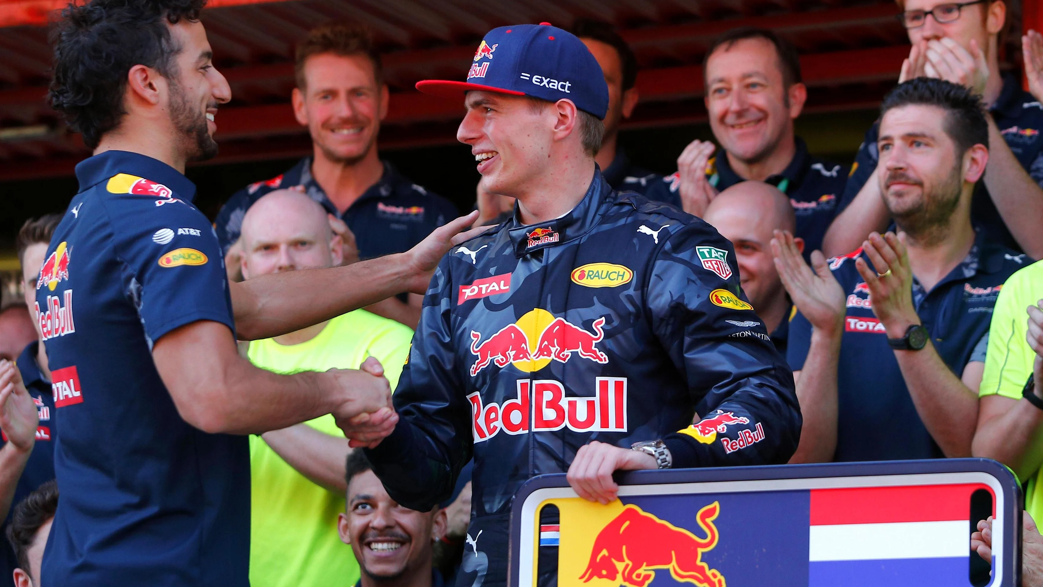 Race winner Max Verstappen (NED) Red Bull Racing celebrates with the team and Daniel Ricciardo