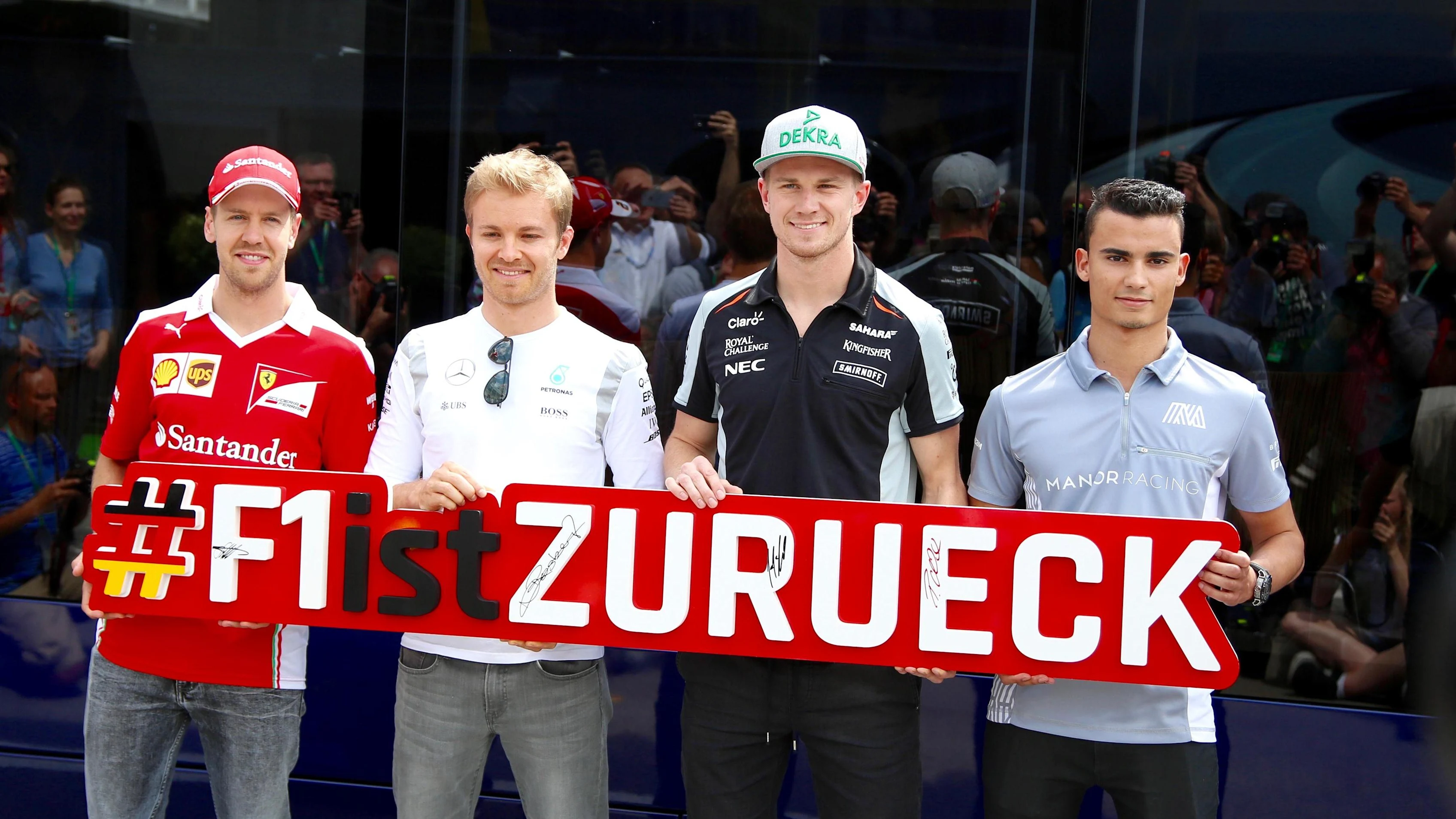 Sebastian Vettel (GER) Ferrari, Nico Rosberg (GER) Mercedes AMG F1, Nico Hulkenberg (GER) Force