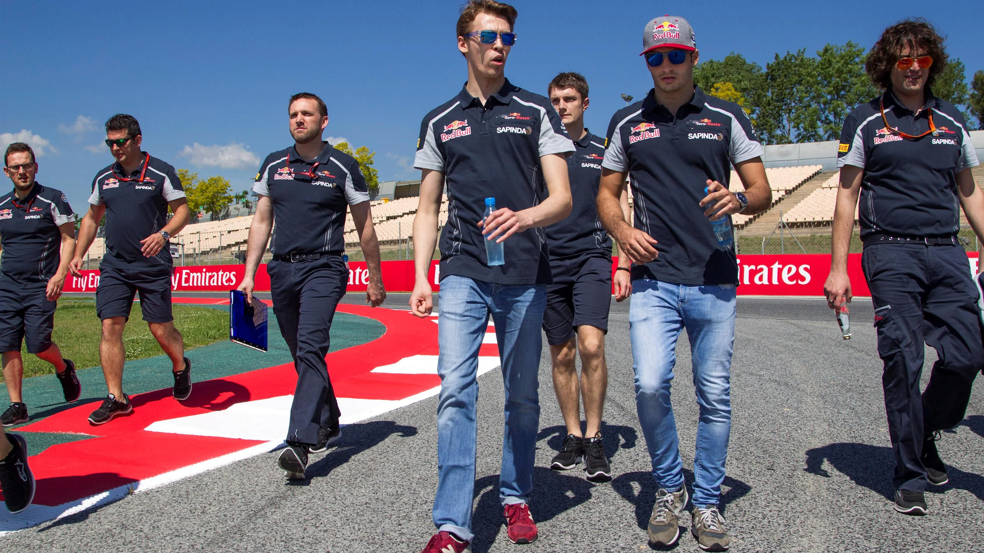 Daniil Kvyat (RUS) Scuderia Toro Rosso and Carlos Sainz jr (ESP) Scuderia Toro Rosso walk the track