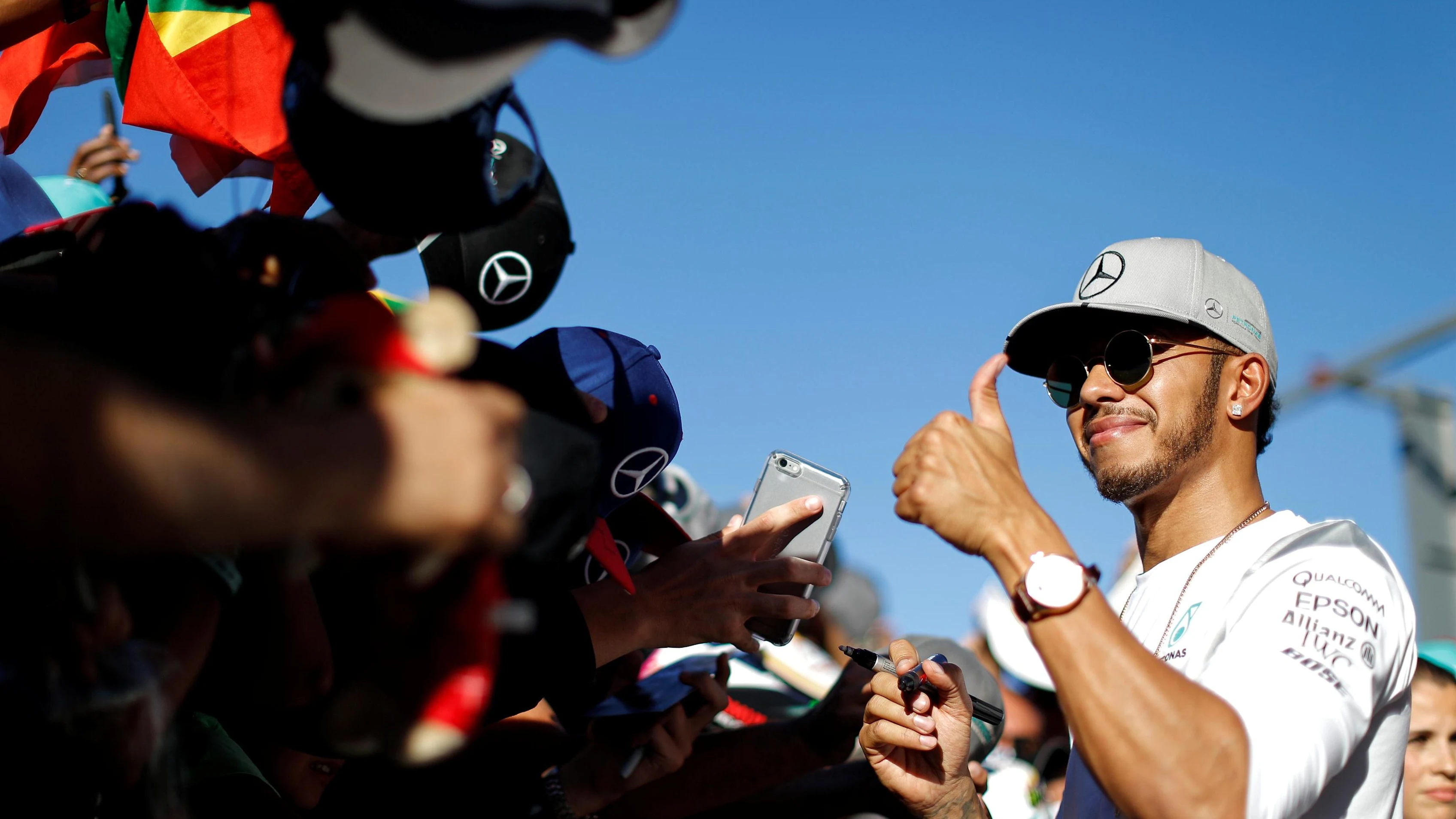 Lewis Hamilton (GBR) Mercedes AMG F1 signs autographs for the fans at Formula One World