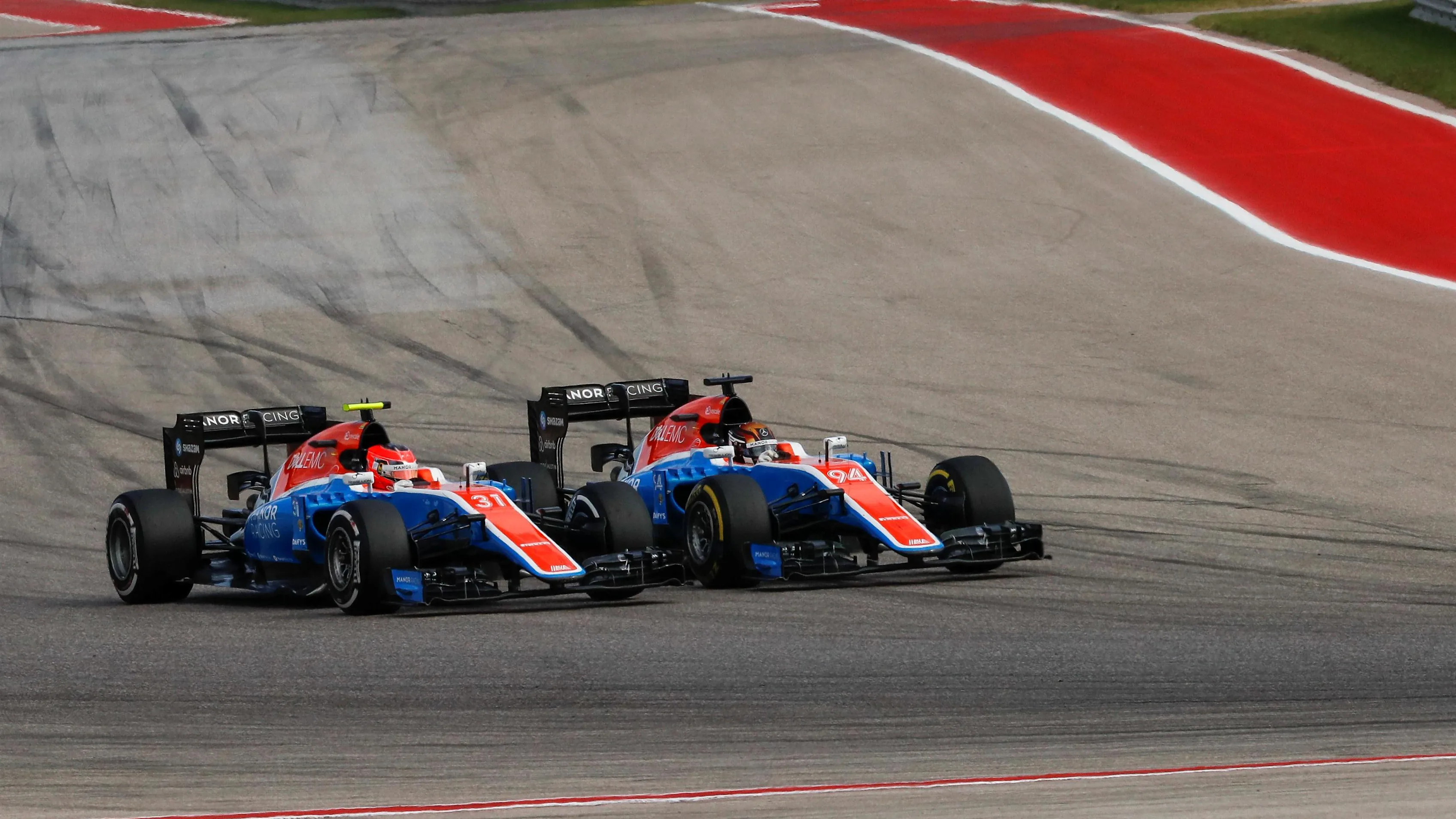 Esteban Ocon (FRA) Manor Racing MRT05 and Pascal Wehrlein (GER) Manor Racing MRT05 battle for position at Formula One World Championship, Rd18, United States Grand Prix, Race, Circuit of the Americas, Austin, Texas, USA, Sunday 23 October 2016. © Sutton Images