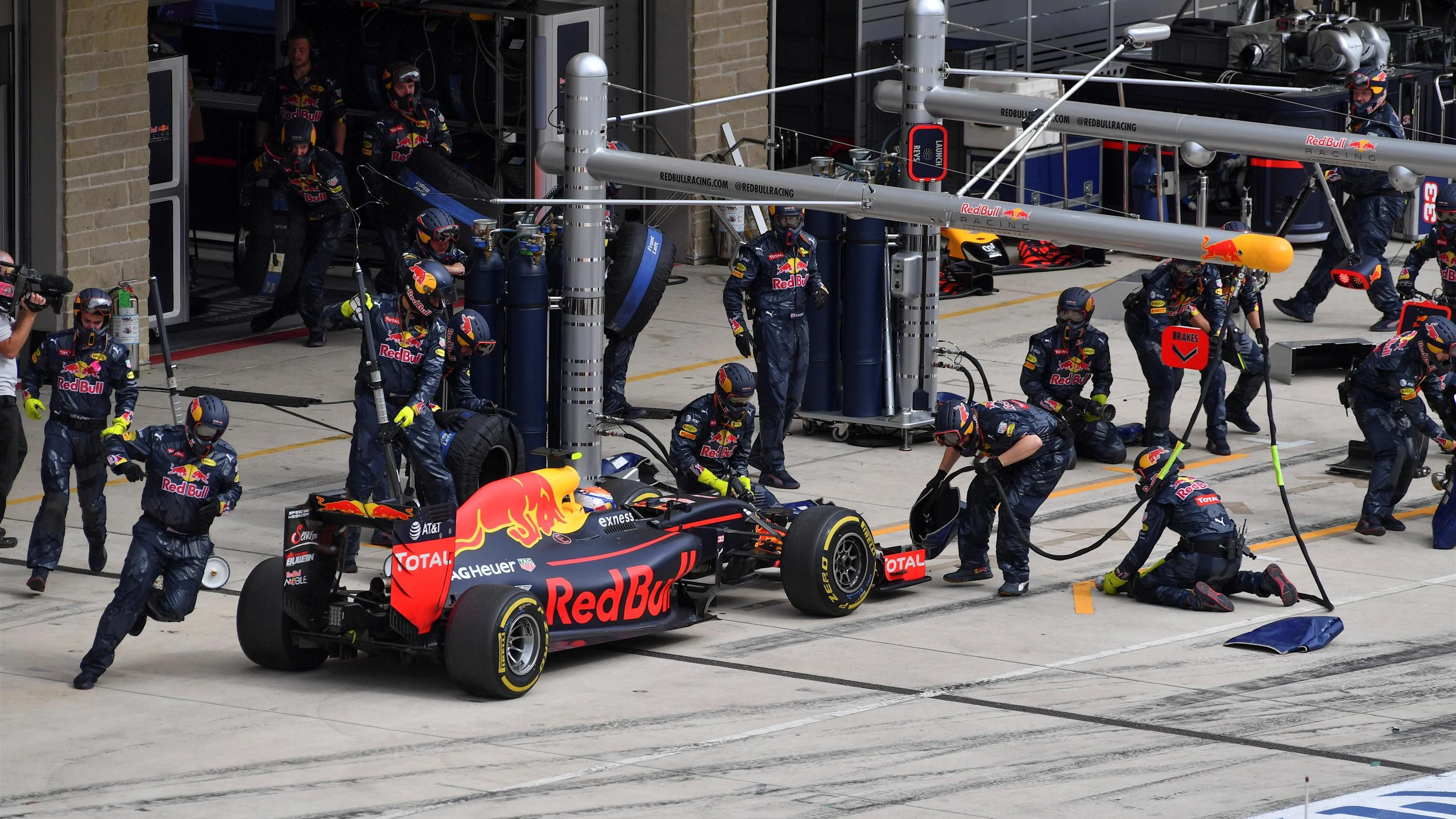 Max Verstappen (NED) Red Bull Racing RB12 arrives in his pit box for a pit stop unexpectedly at