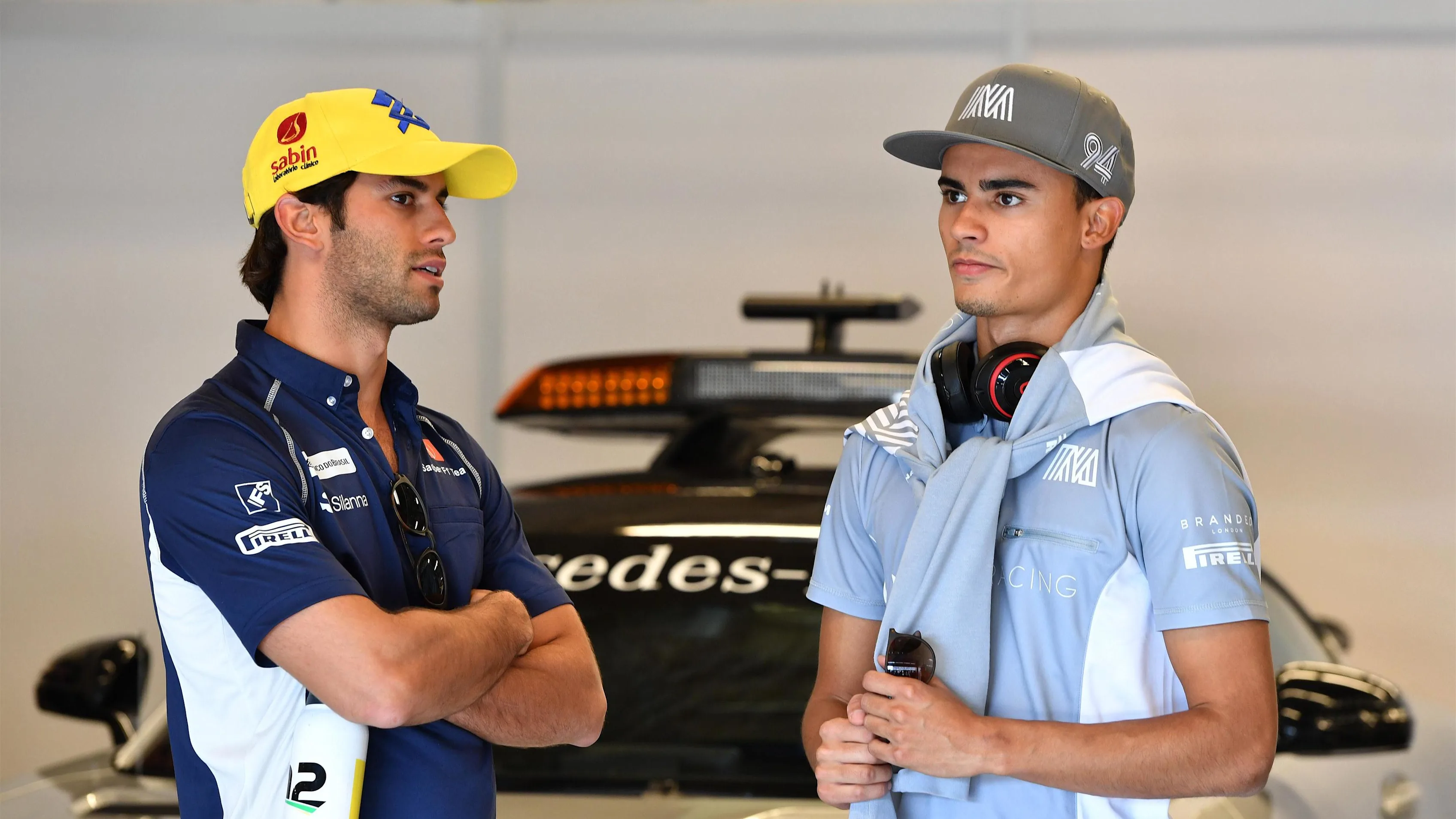 Felipe Nasr (BRA) Sauber and Pascal Wehrlein (GER) Manor Racing on the drivers parade at Formula
