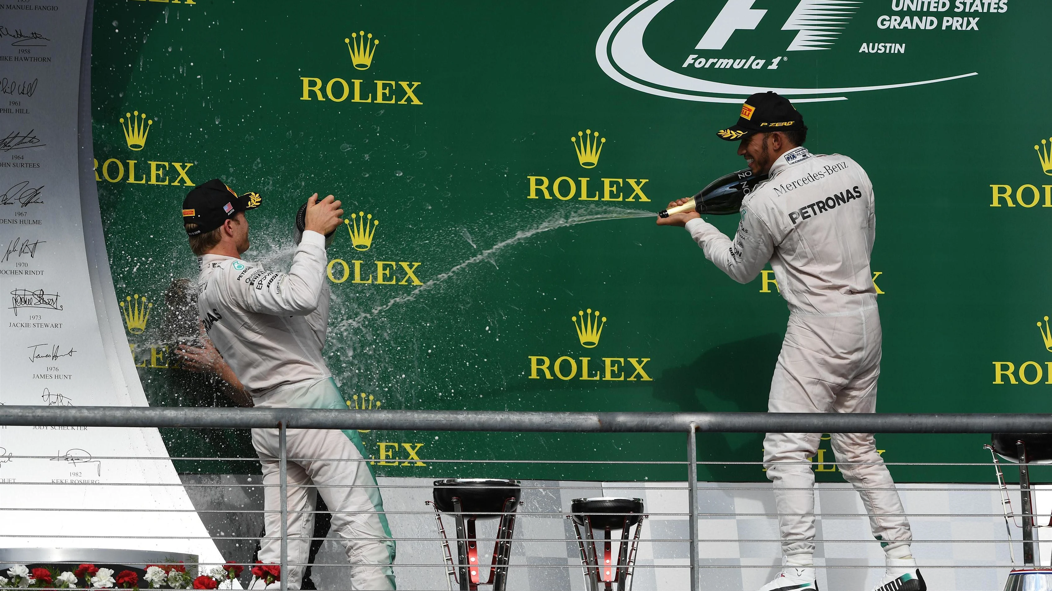 Nico Rosberg (GER) Mercedes AMG F1 and Lewis Hamilton (GBR) Mercedes AMG F1 celebrate on the podium