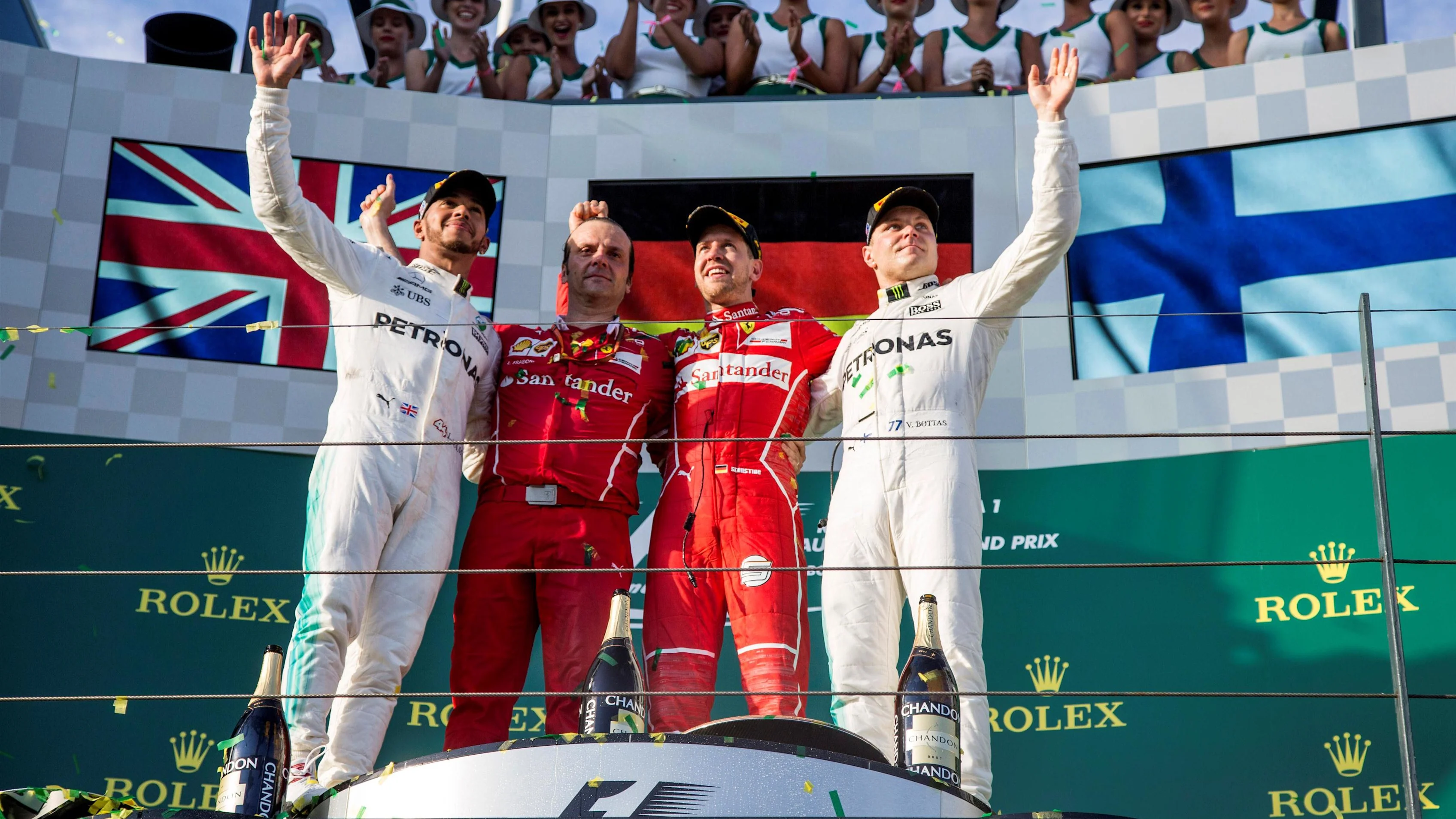 Lewis Hamilton (GBR) Mercedes AMG F1, Luigi Fraboni (ITA) Ferrari Head of Engine Trackside Operations, race winner Sebastian Vettel (GER) Ferrari and Valtteri Bottas (FIN) Mercedes AMG F1 celebrate on the podium at Formula One World Championship, Rd1, Australian Grand Prix, Race, Albert Park, Melbourne, Australia, Sunday 26 March 2017. © Sutton Motorsport Images