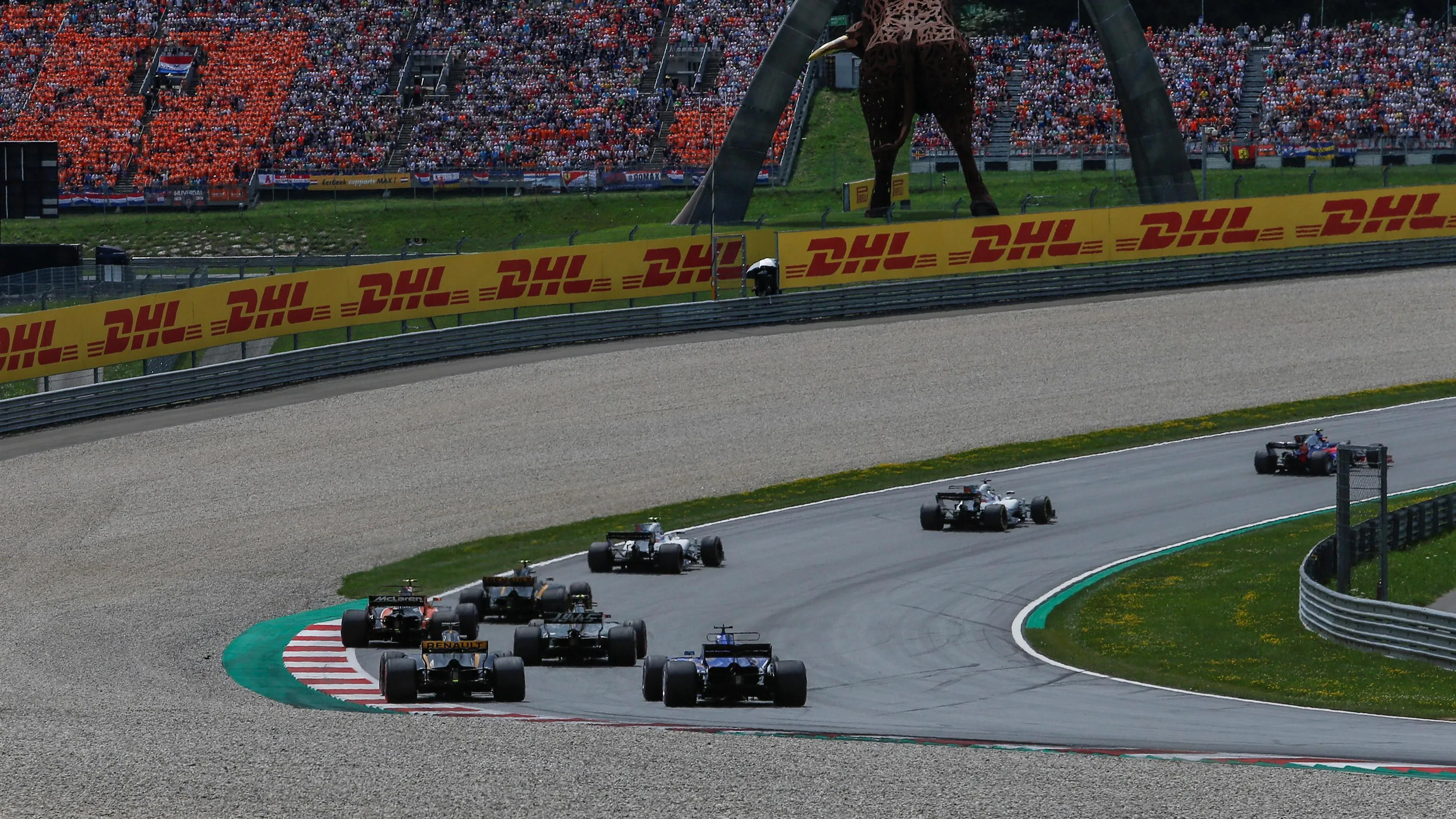 Lap one action at Formula One World Championship, Rd9, Austrian Grand Prix, Race, Spielberg,
