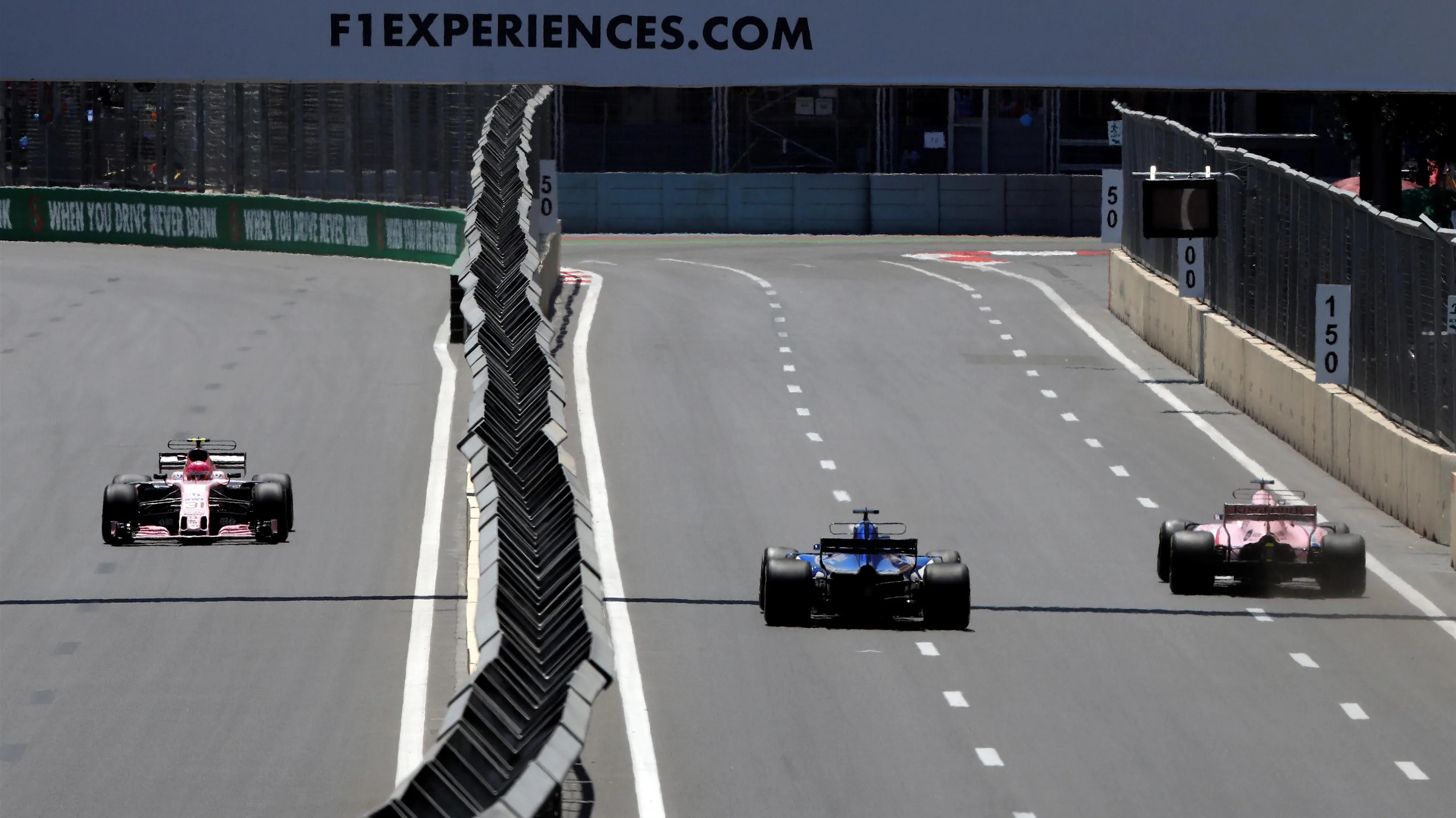 Marcus Ericsson (SWE) Sauber C36, Sergio Perez (MEX) Force India VJM10 and Esteban Ocon (FRA) Force