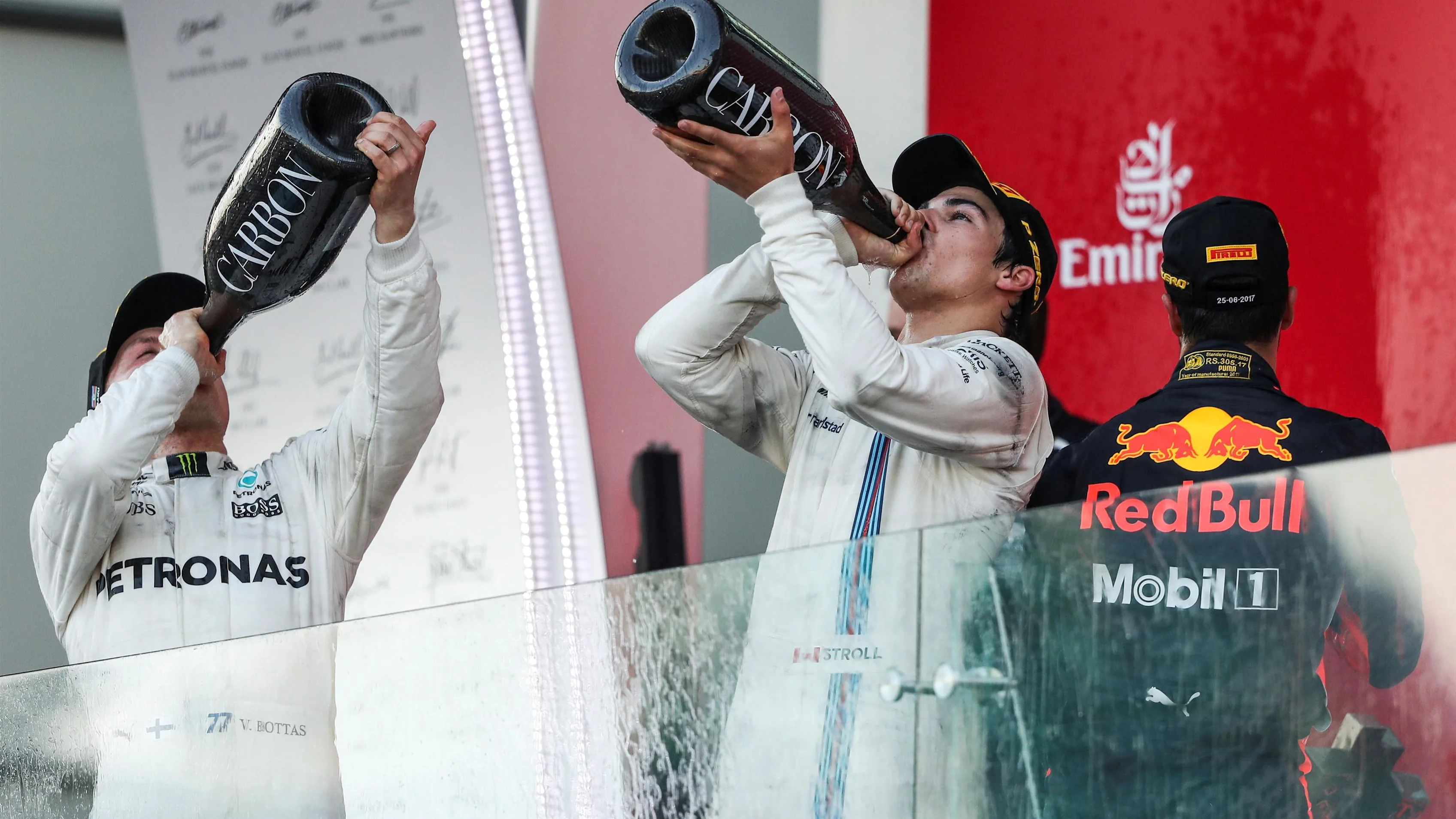 Valtteri Bottas (FIN) Mercedes AMG F1, Lance Stroll (CDN) Williams and Daniel Ricciardo (AUS) Red