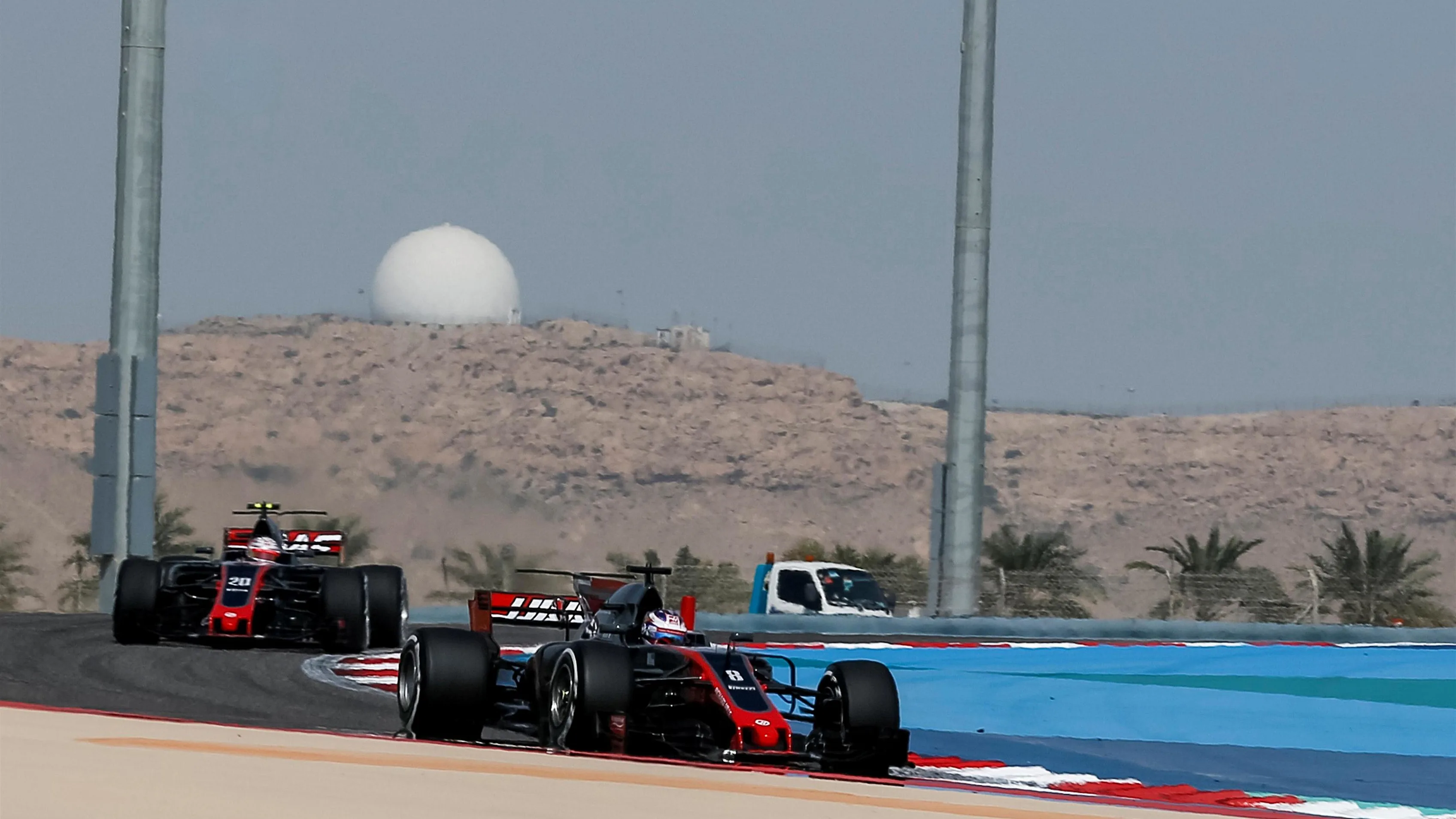 Romain Grosjean (FRA) Haas VF-17 and Kevin Magnussen (DEN) Haas VF-17 at Formula One World