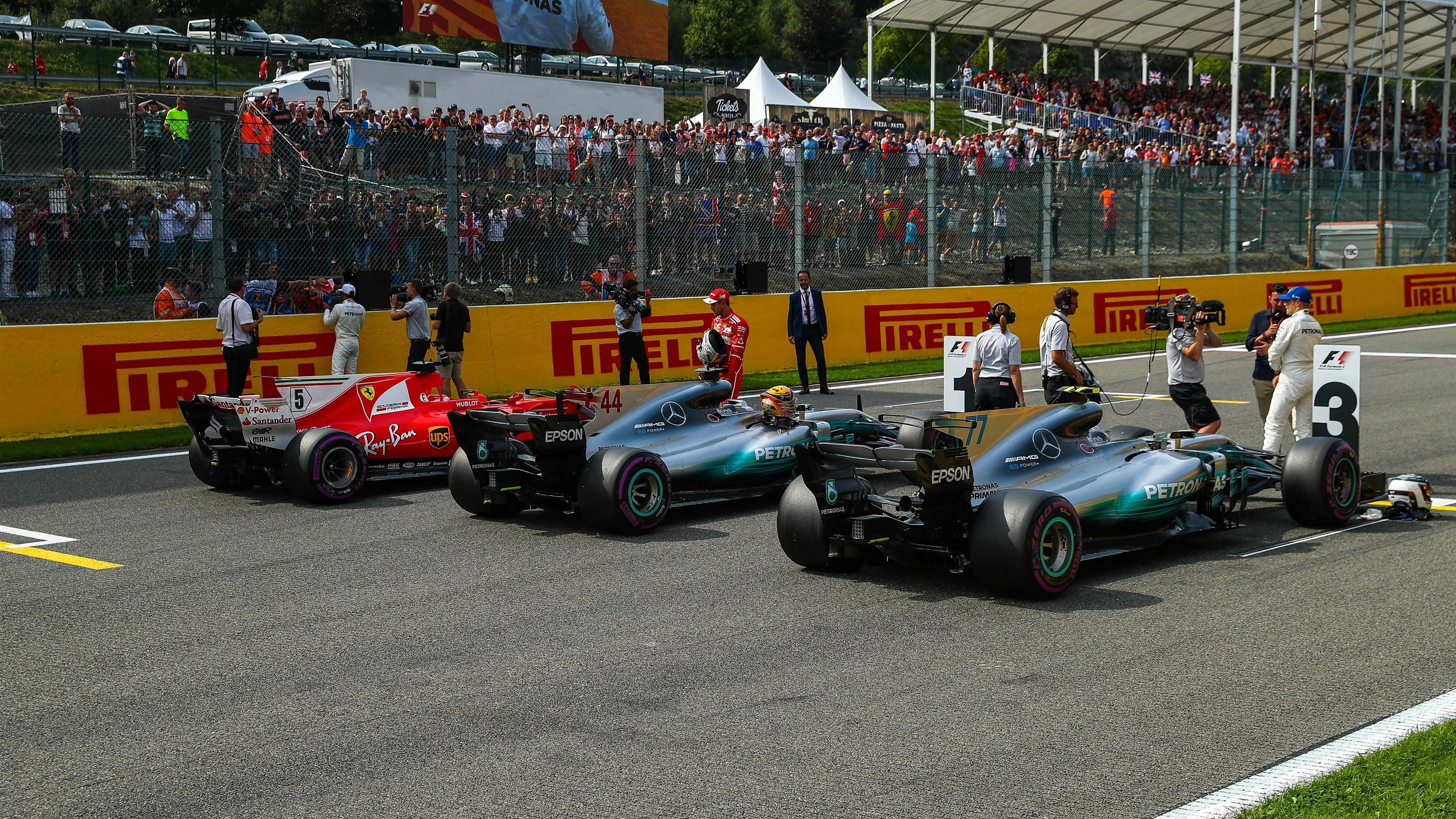 Hamilton (GBR) Mercedes AMG F1, Vettel (GER) Ferrari and Bottas (FIN) Mercedes AMG F1 celebrate in parc ferme at Formula One World Championship, Rd12, Belgian Grand Prix, Qualifying, Spa Francorchamps, Belgium, Saturday 26 August 2017.