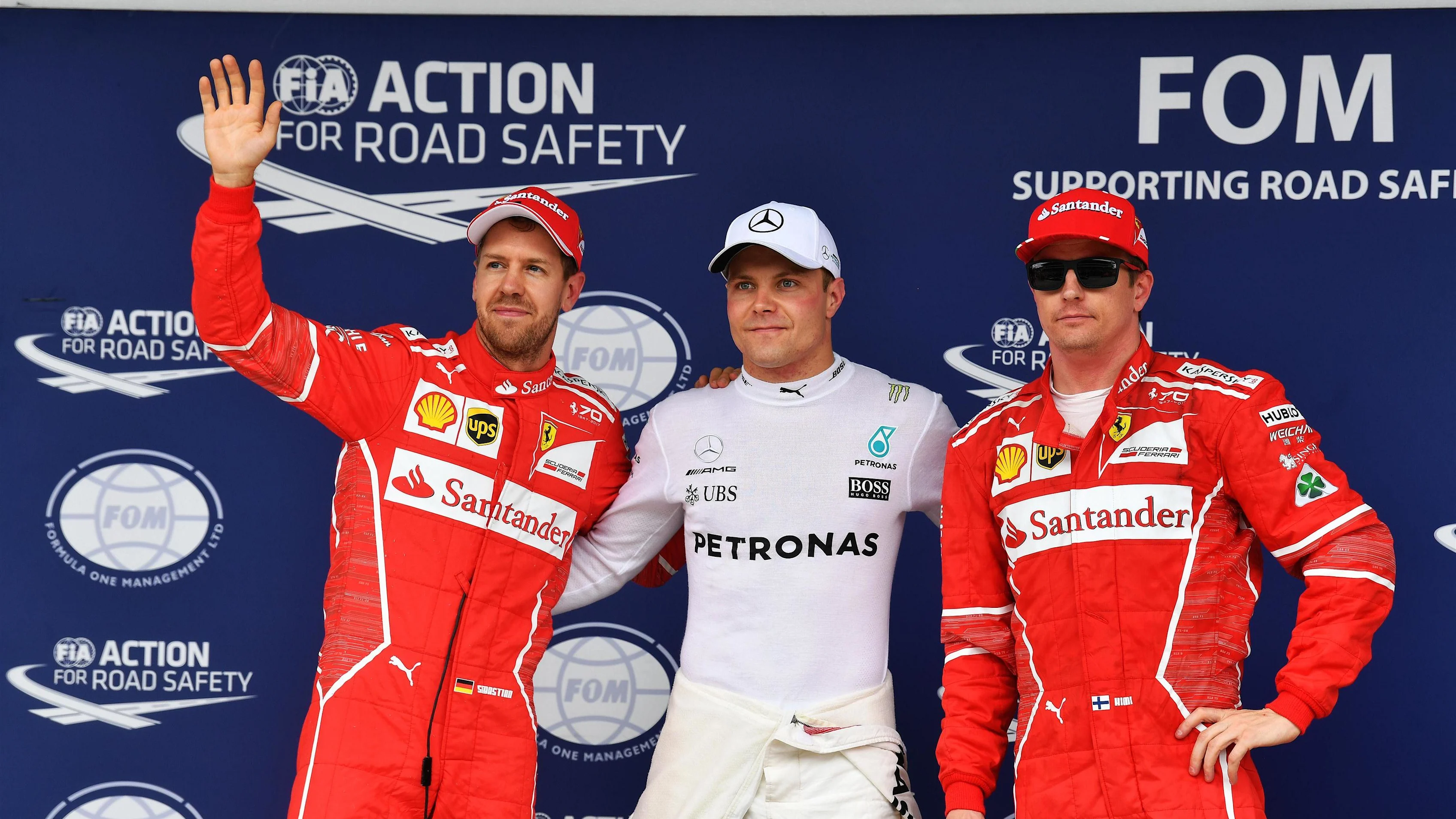 (L to R): Sebastian Vettel (GER) Ferrari, pole sitter Valtteri Bottas (FIN) Mercedes AMG F1 and Kimi Raikkonen (FIN) Ferrari celebrate in parc ferme at Formula One World Championship, Rd19, Brazilian Grand Prix, Qualifying, Interlagos, Sao Paulo, Brazil, Saturday 11 November 2017. © Mark Sutton/Sutton Images