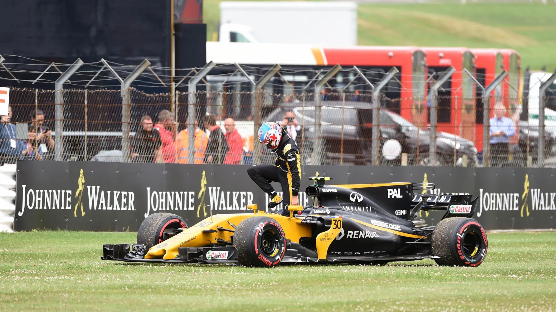 Race retiree Jolyon Palmer (GBR) Renault Sport F1 Team RS17 stops on track on the parade lap at