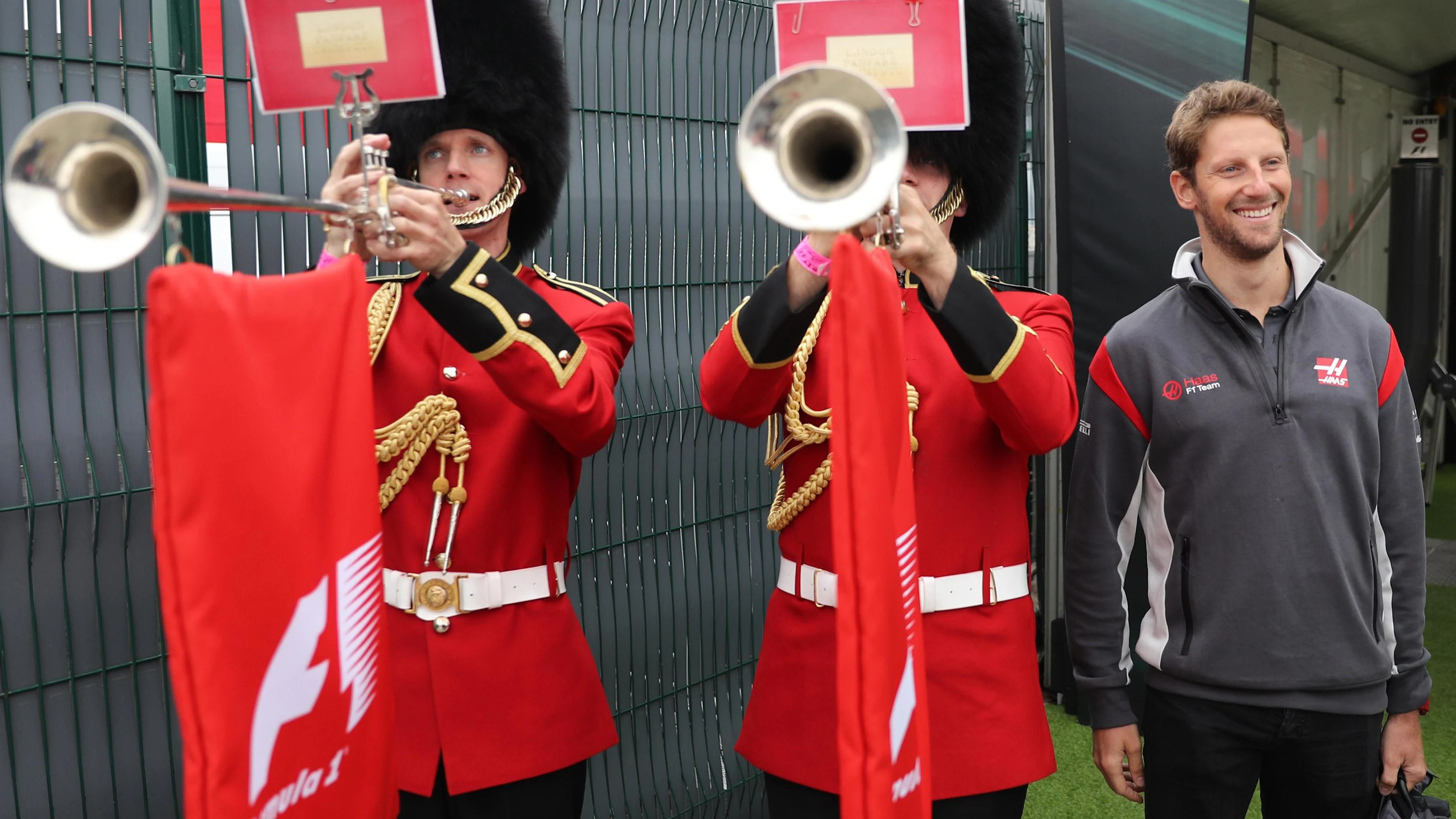 Romain Grosjean (FRA) Haas F1 and Palace Guards at Formula One World Championship, Rd10, British Grand Prix, Race, Silverstone, England, Sunday 16 July 2017. © Sutton Images