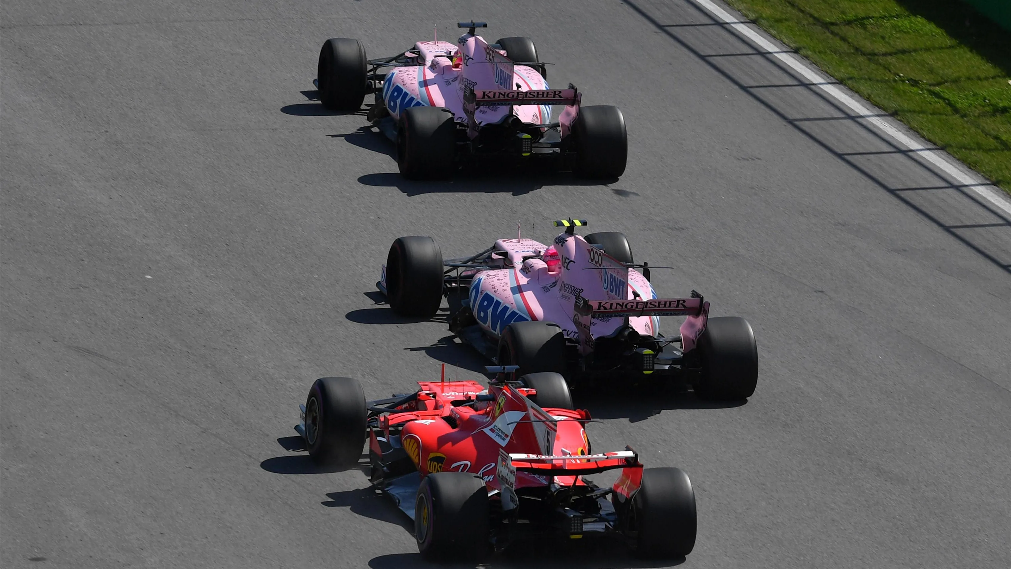 Sergio Perez (MEX) Force India VJM10, Esteban Ocon (FRA) Force India VJM10 and Sebastian Vettel (GER) Ferrari SF70-H battle at Formula One World Championship, Rd7, Canadian Grand Prix, Race, Montreal, Canada, Sunday 11 June 2017. © Sutton Motorsport Images