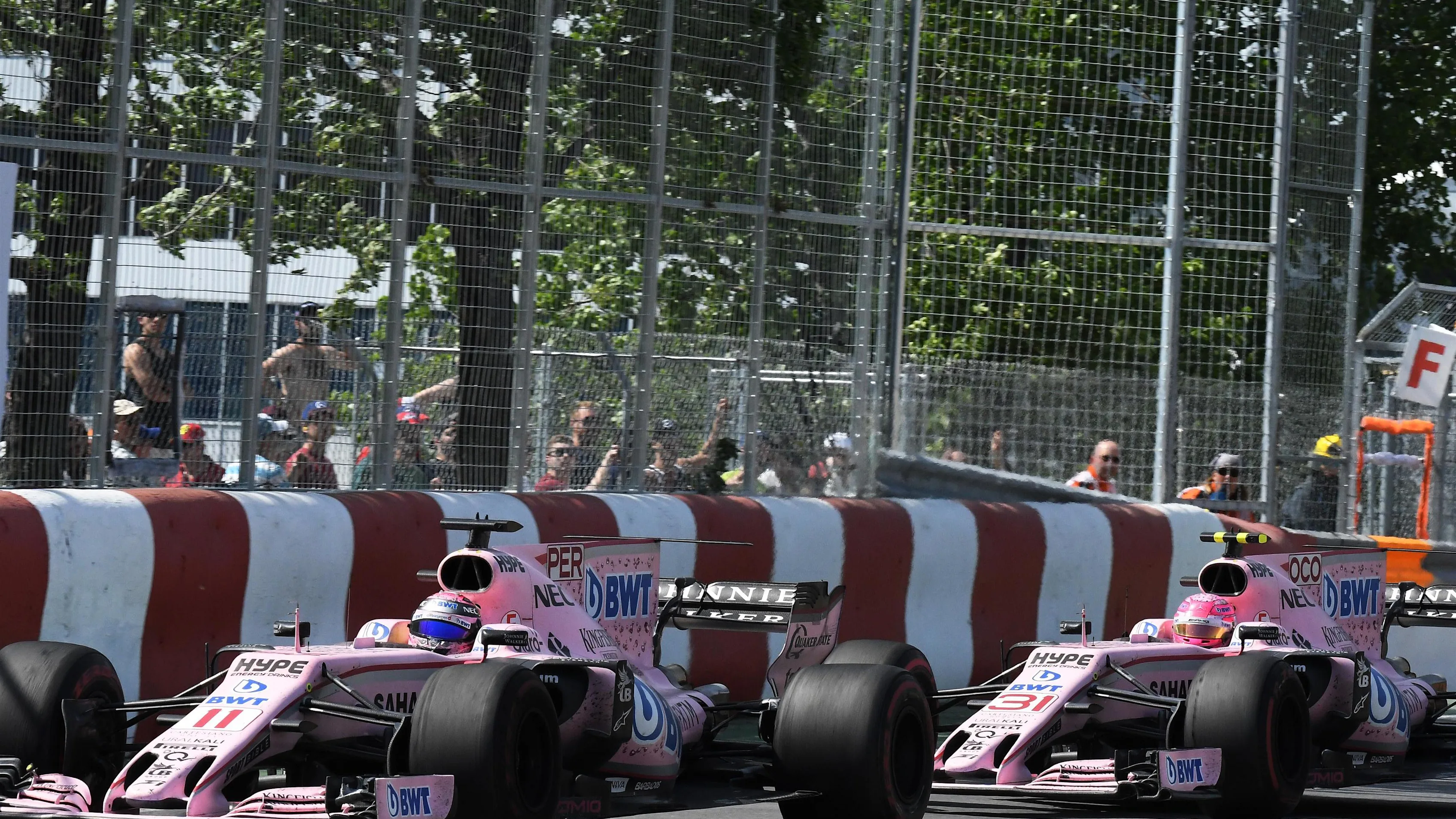 Sergio Perez (MEX) Force India VJM10 leads Esteban Ocon (FRA) Force India VJM10 at Formula One