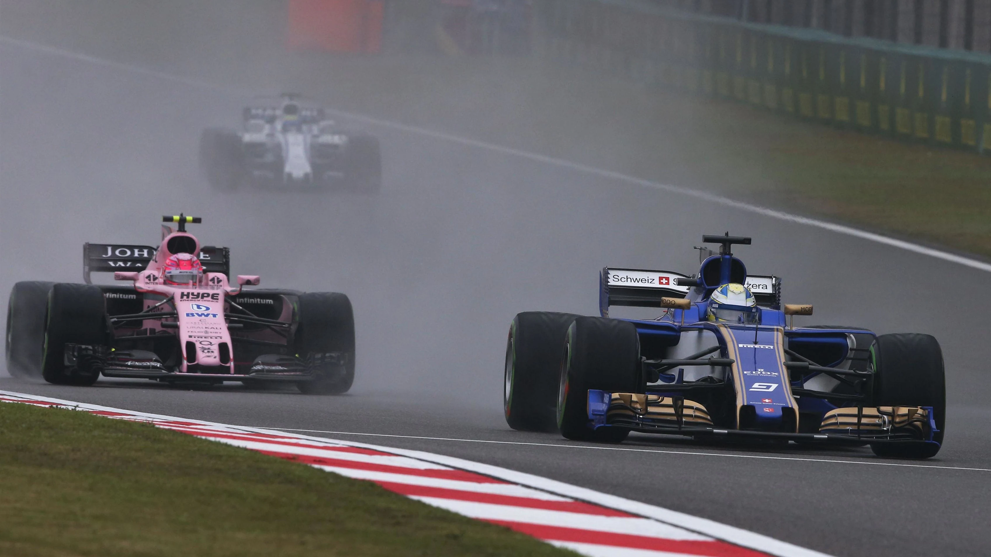 Marcus Ericsson (SWE) Sauber C36 and Esteban Ocon (FRA) Force India VJM10 at Formula One World Championship, Rd2, Chinese Grand Prix, Practice, Shanghai, China, Friday 7 April 2017. © Sutton Motorsport Images