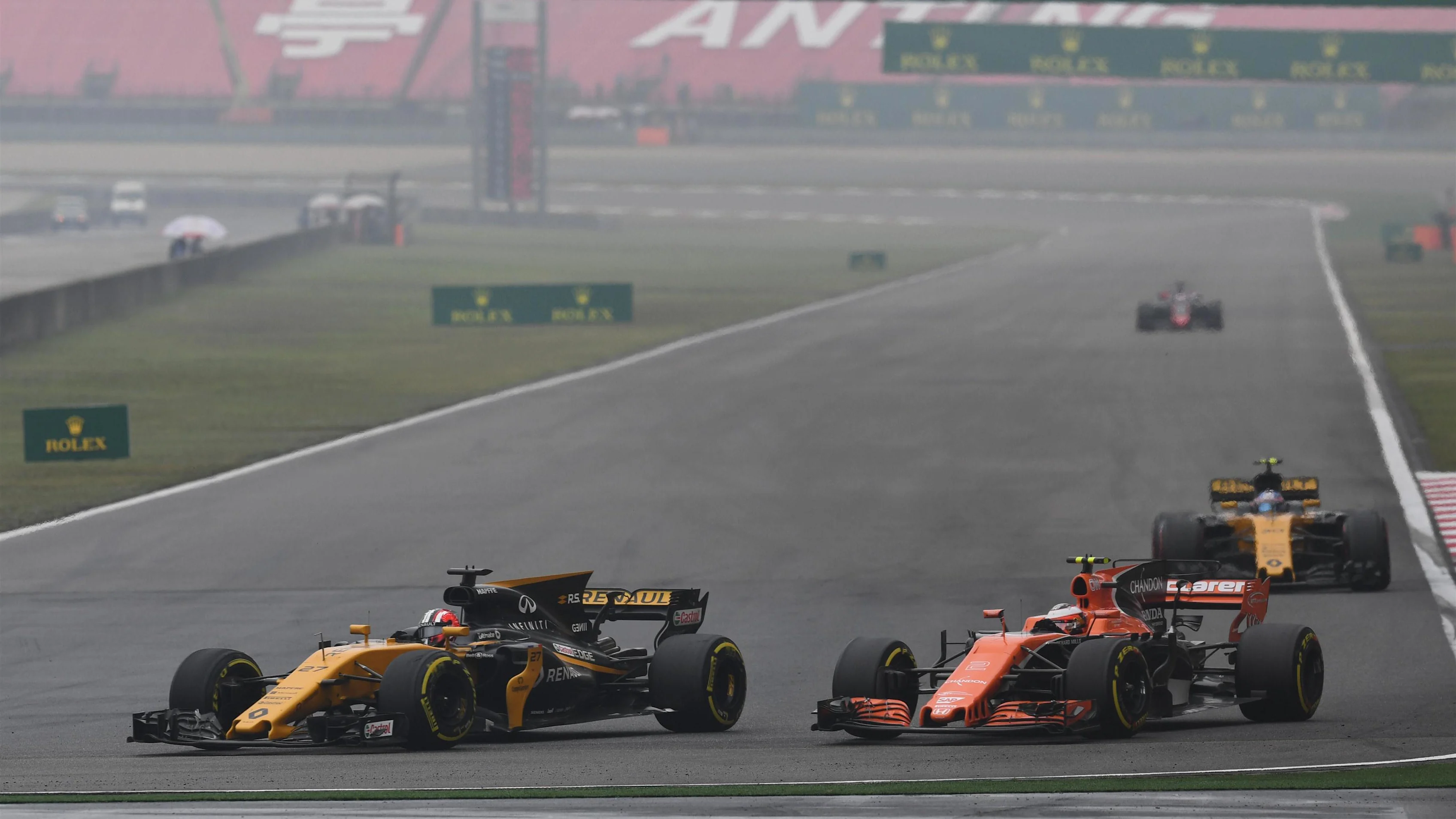Nico Hulkenberg (GER) Renault Sport F1 Team RS17 and Stoffel Vandoorne (BEL) McLaren MCL32 at Formula One World Championship, Rd2, Chinese Grand Prix, Race, Shanghai, China, Sunday 9 April 2017. © Sutton Motorsport Images